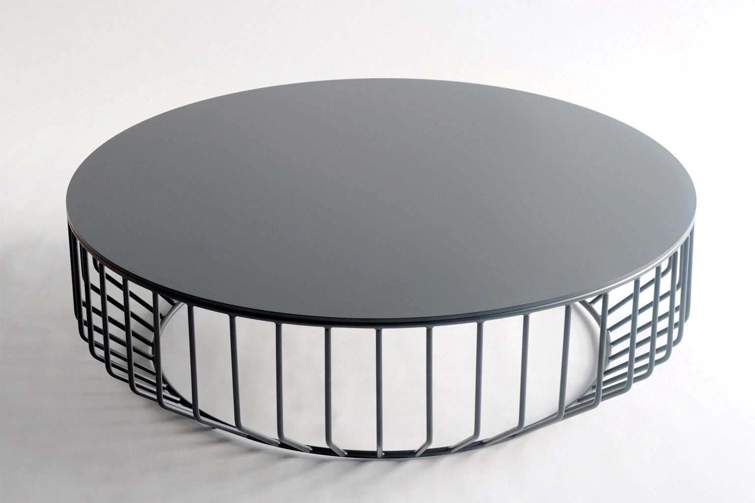Wired Large Coffee Table by Phase Design
Dimensions: Ø 106.7 x H 33 cm. 
Materials: Powder-coated metal.

Solid steel bar and round plate. Steel available in gloss or flat white, black, gray, or yellow powder coat. Powder coat finishes also