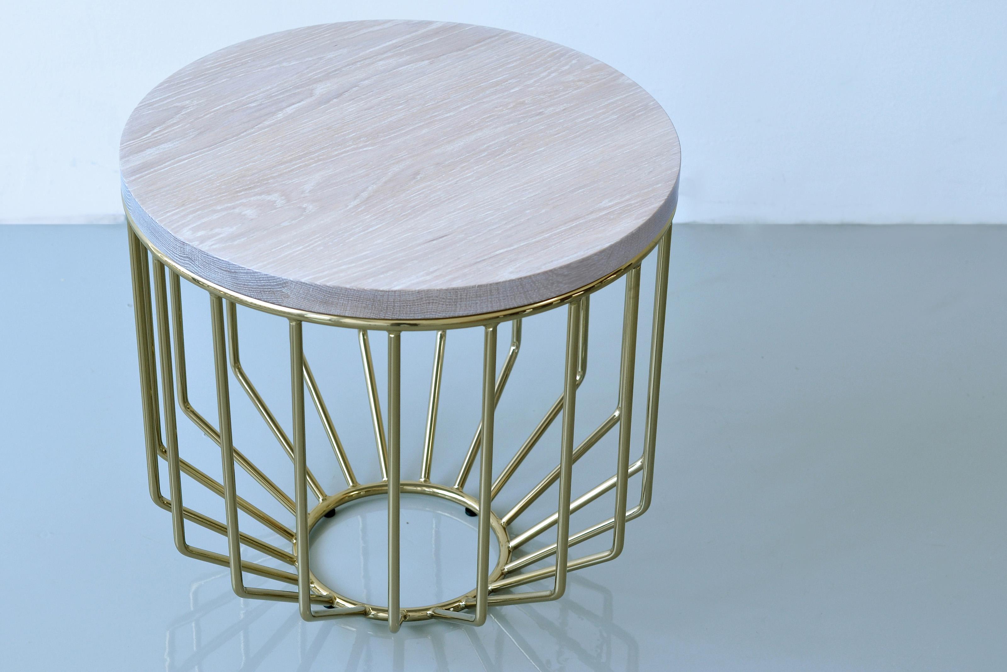 Wired Side Table by Phase Design
Dimensions: Ø 45.7 x H 43.2 cm. 
Materials: White oak and smoked brass.

Solid steel bar with solid wooden tops, available in walnut, white oak, or ebonized oak. Steel available in gloss or flat black and white