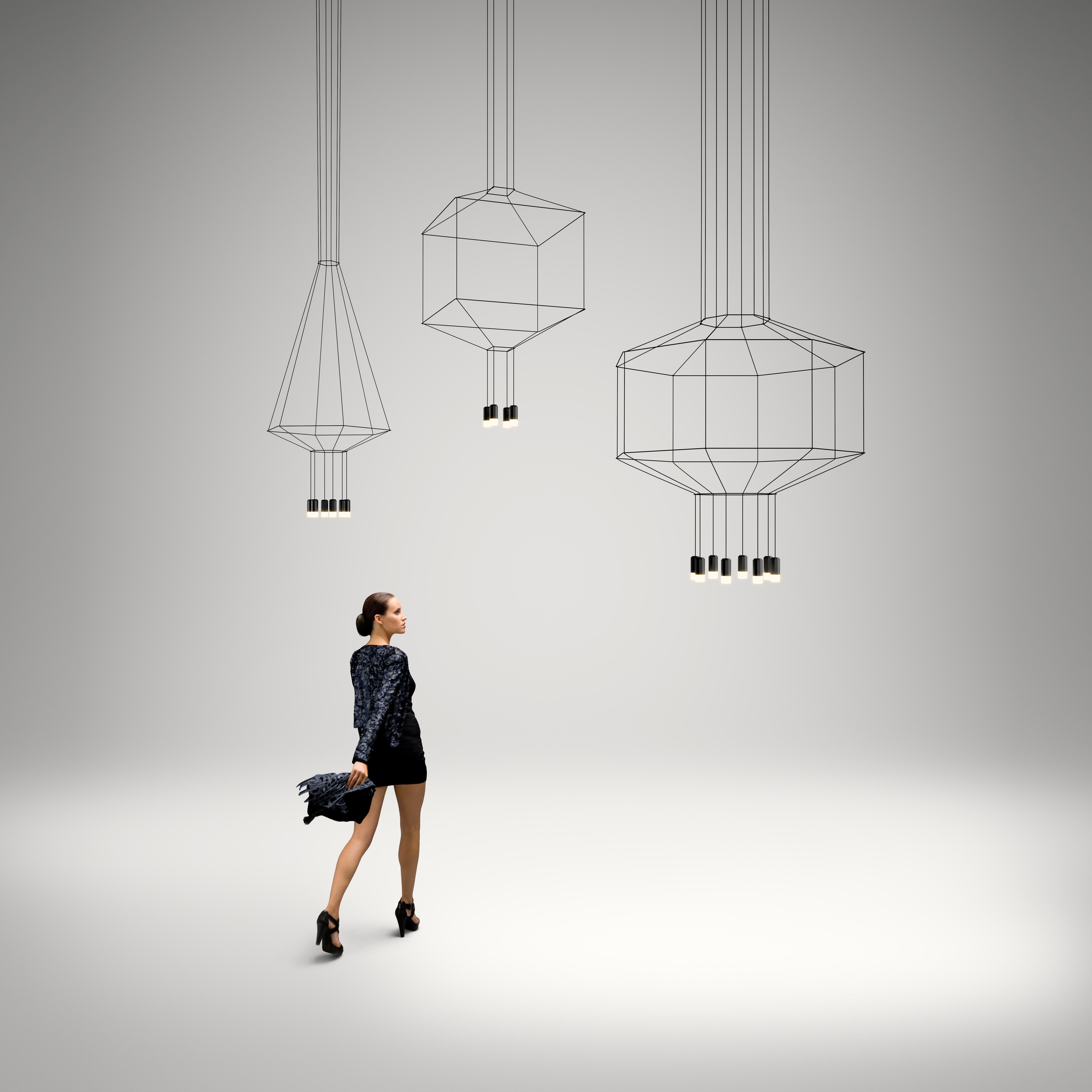 Wireflow designed by Arik Levy. A hanging lamp which reviews and updates the chandelier look through an exercise of simplification that explores its essence and enhances its outline with great delicacy and at the same time a strong formal presence.