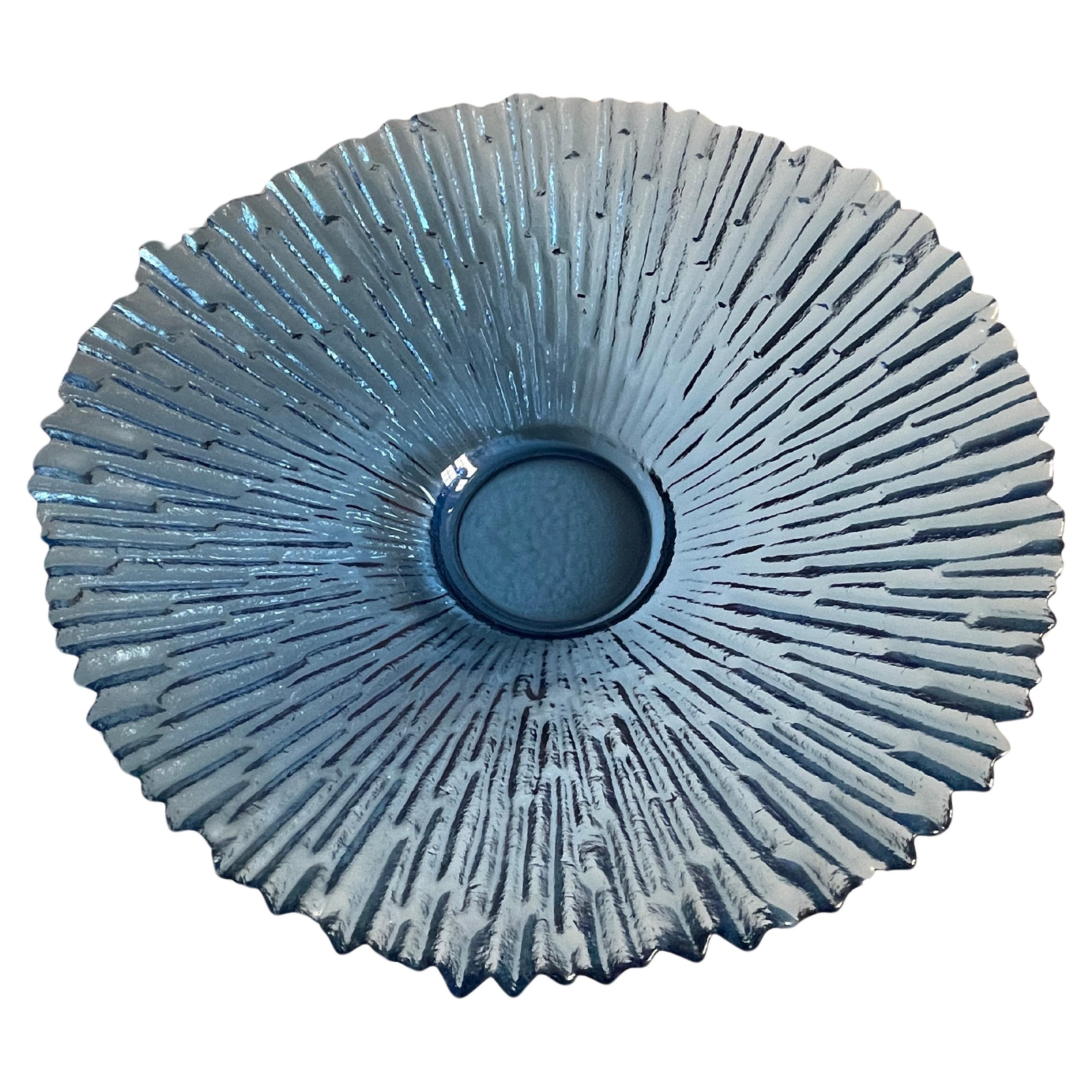  1970's Scandinavian blue glass icicle centrepiece bowl, designed by Tauno Wirkkala, Finland. The bowl has a wonderful translucent  quality as the light comes through. Hand made in a centrifugal mold., then the interior has been highly polished by