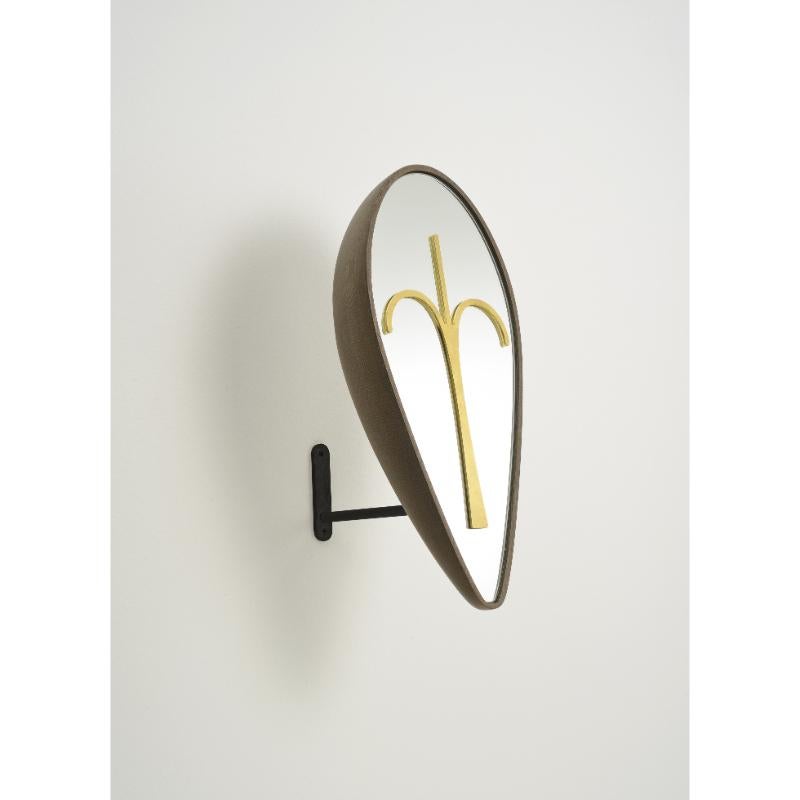 Wise Mirror, Bikita with Hanger by Colé Italia with Lorenza Bozzoli
Dimensions: H.51 D.15 W.20 cm
Materials: High forehead mirror mask in solid beech wood wing stained with brass details;
black lacquered metal base

Also Available: Wise Mirror; Eze,