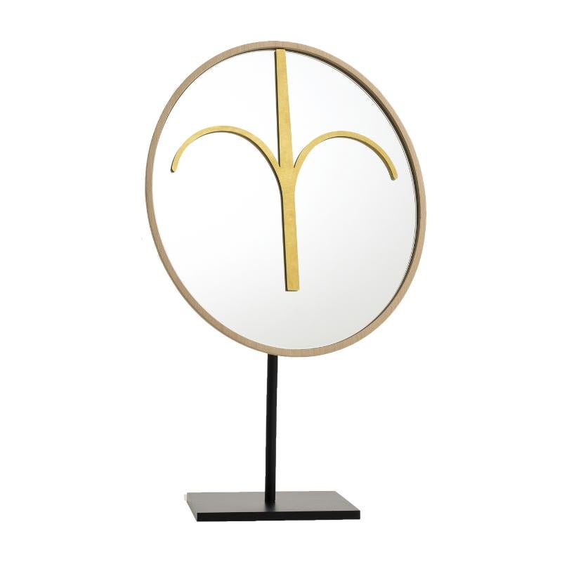 Wise mirror, Haua by Colé Italia with Lorenza Bozzoli
Dimensions: H.51 D.15 W.20 cm
Materials: High forehead mirror mask in solid beech wood wing stained with brass details;
black lacquered metal base

Also Available: Wise Mirror; Eze, Bikita