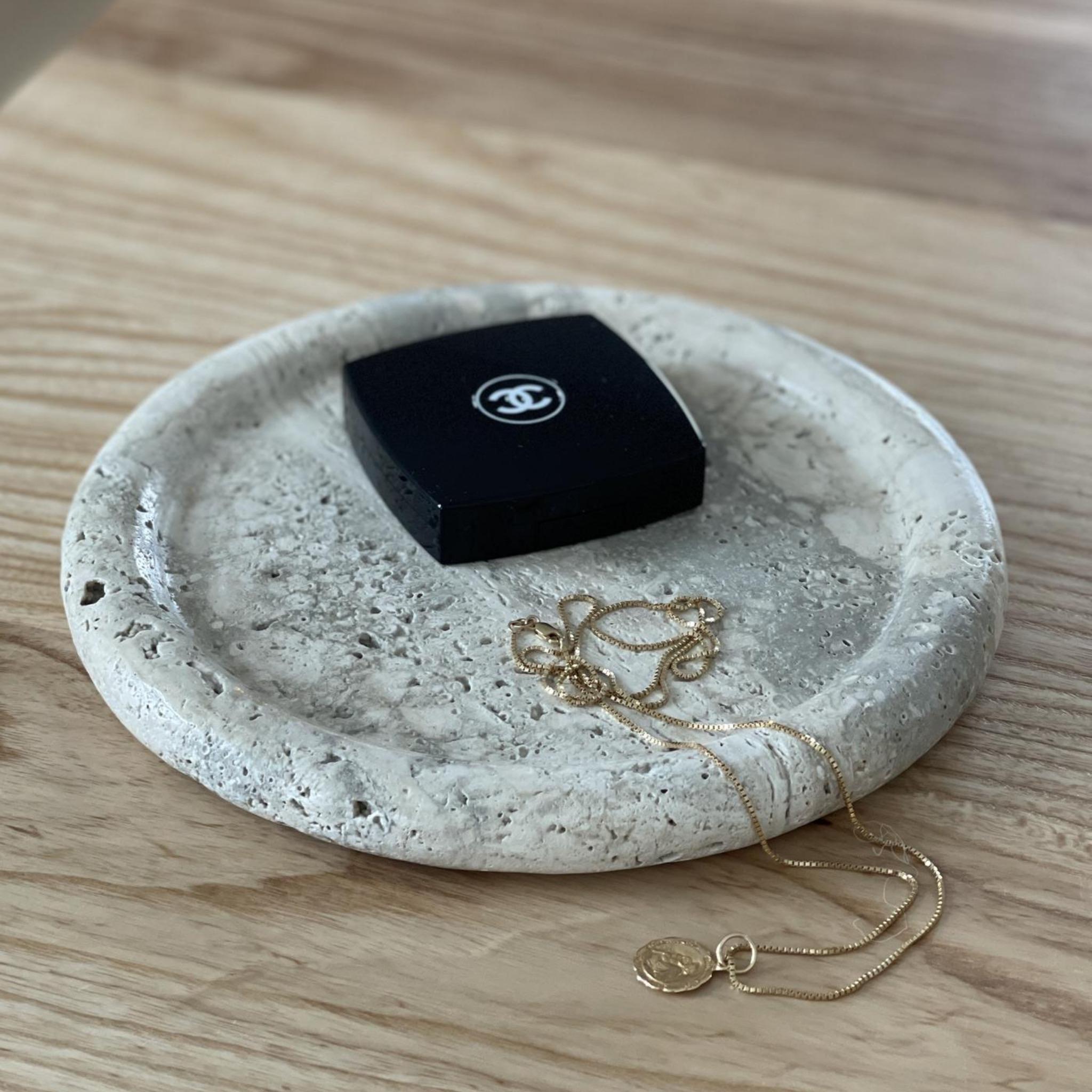 A limited production, functional object d'art exclusively produced by Anastasio Home.

The Wish is a minimal, eight-inch round dish cut from a single piece of solid marble or stone with a medium “puff” border, hand-finished by artisans in a