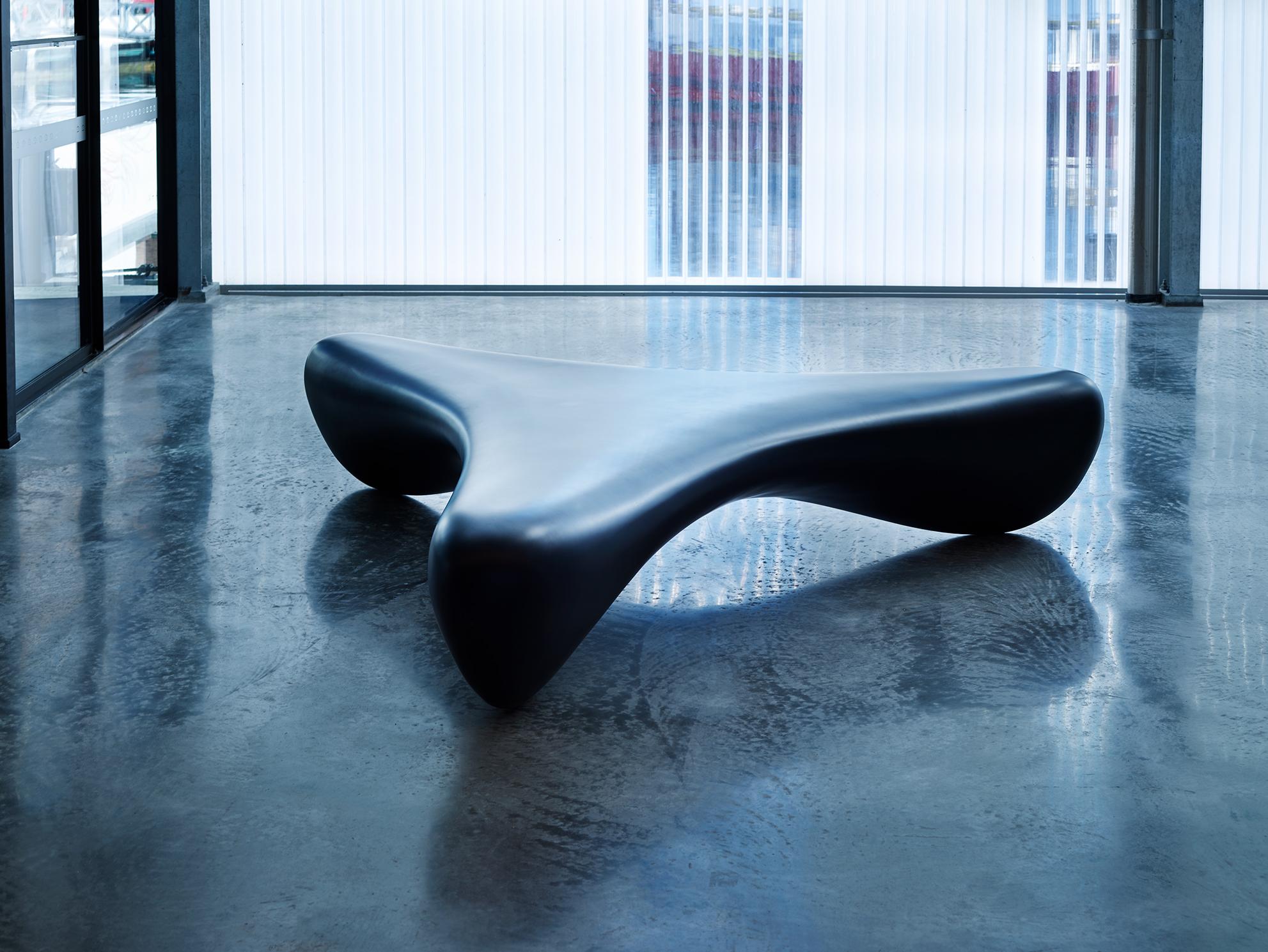 With a long, undulating three-way symmetry, the organic wishbone bench seat creates a sculpturally striking form which is reminiscent of a whale-bone. Available in black and white as standard with custom colors available on request, the Wishbone can