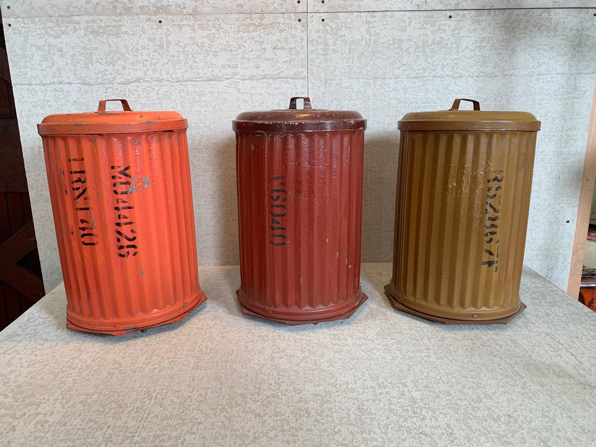 Painted in various colors, these corrugated, galvanized pigment cans were salvaged from an Eastern PA paint company established in 1878. Perfect size and form provides a multitude of storage solutions. Close fitting lids keep the elements out and