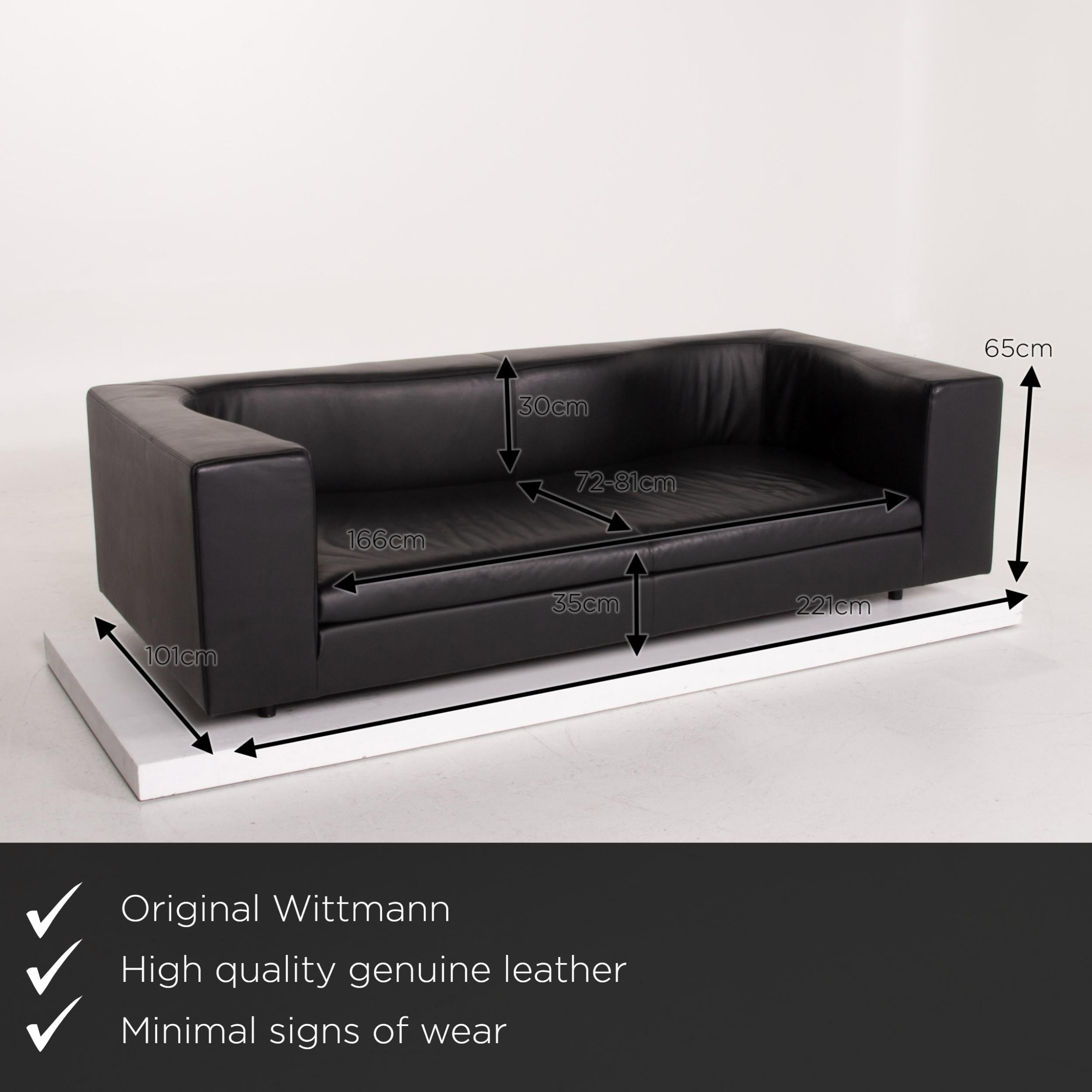 We present to you a Wittmann leather sofa black three-seat.

 

 Product measurements in centimeters:
 

Depth 101
Width 221
Height 65
Seat height 35
Rest height 65
Seat depth 72
Seat width 166
Back height 30.