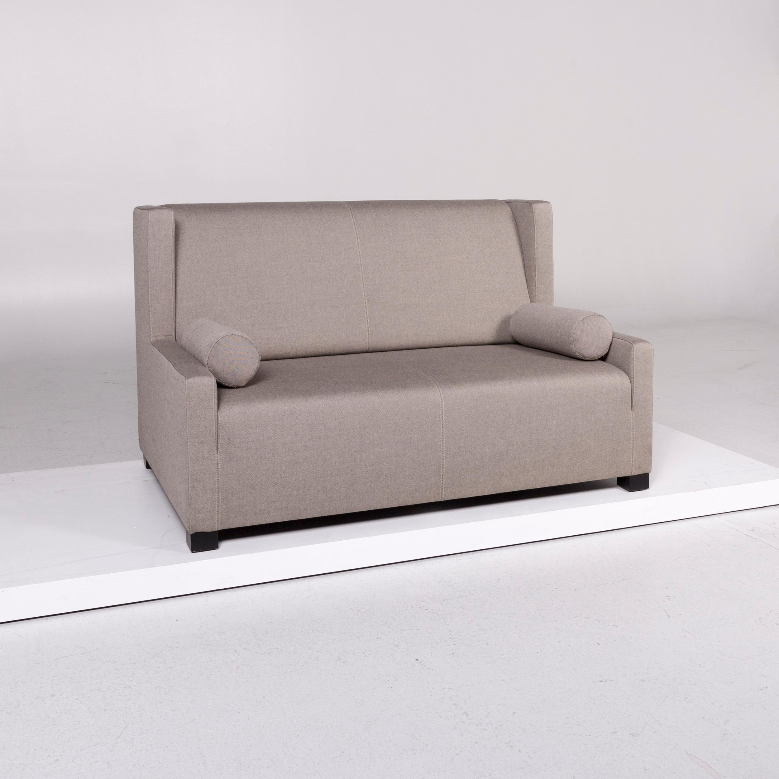We bring to you a Wittmann Museo fabric sofa gray two-seat couch.
 

Product measurements in centimetres:
 

Depth 91
Width 141
Height 86
Seat-height 39
Rest-height 46
Seat-depth 58
Seat-width 123
Back-height 48.
   