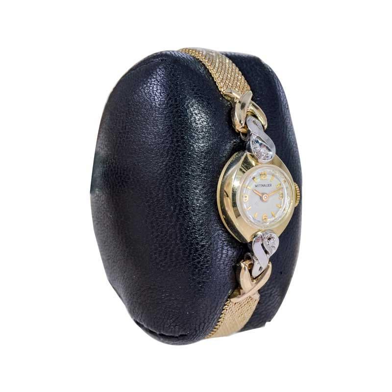 FACTORY / HOUSE:
STYLE / REFERENCE: Mid Century / Reference 7787
METAL / MATERIAL: 14Kt. Solid Gold with Original Gold Filled Bracelet
CIRCA / YEAR: 1960's
DIMENSIONS / SIZE: Length 28mm X Diameter 14mm
MOVEMENT / CALIBER: Manual Winding / 17 Jewels