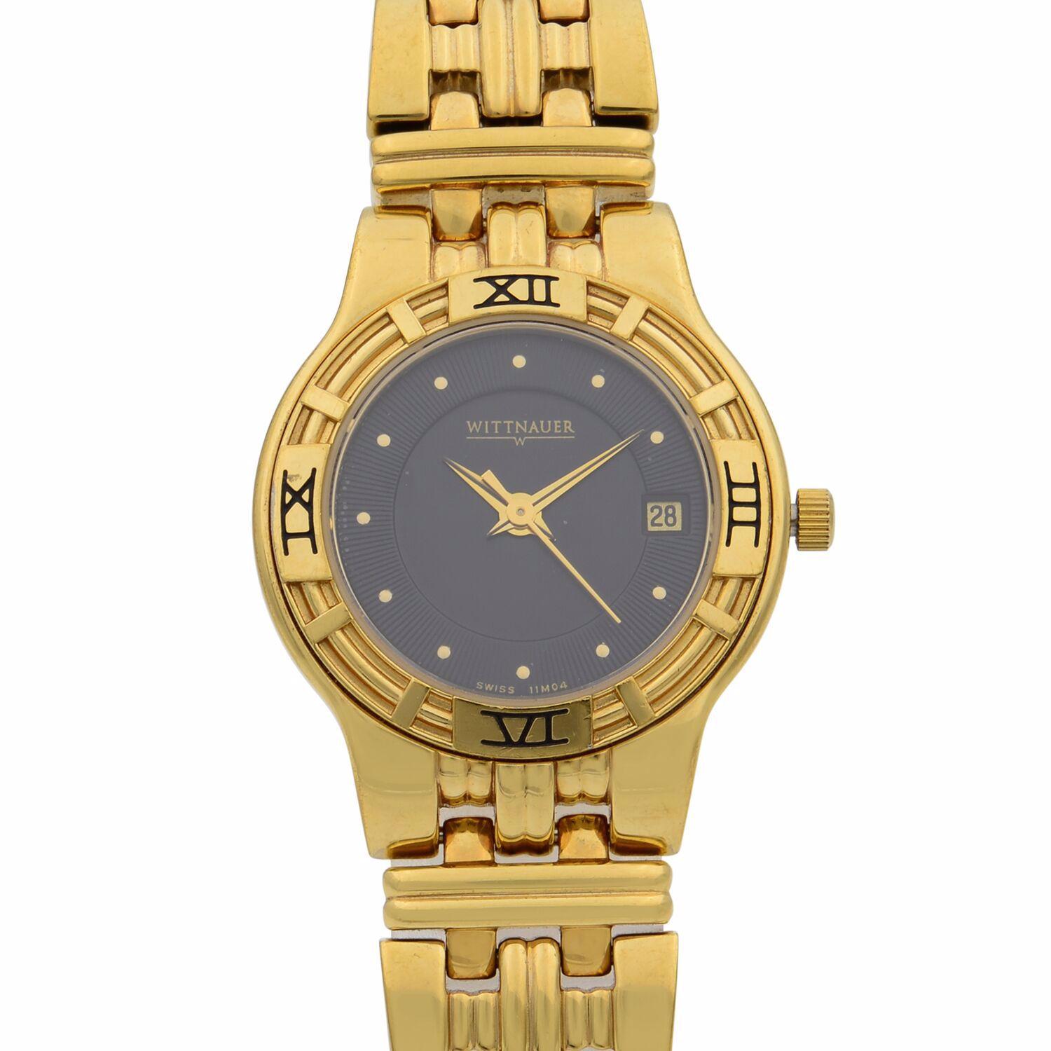 Pre-owned Wittnauer 25mm Gold Tone Steel Date Black Dial Ladies Quartz Watch 11M04. Minor scratches and blemishes on back case on case and on band. This Beautiful Timepiece is Powered by a Quartz (Battery) Movement and Features: Gold-Tone Stainless