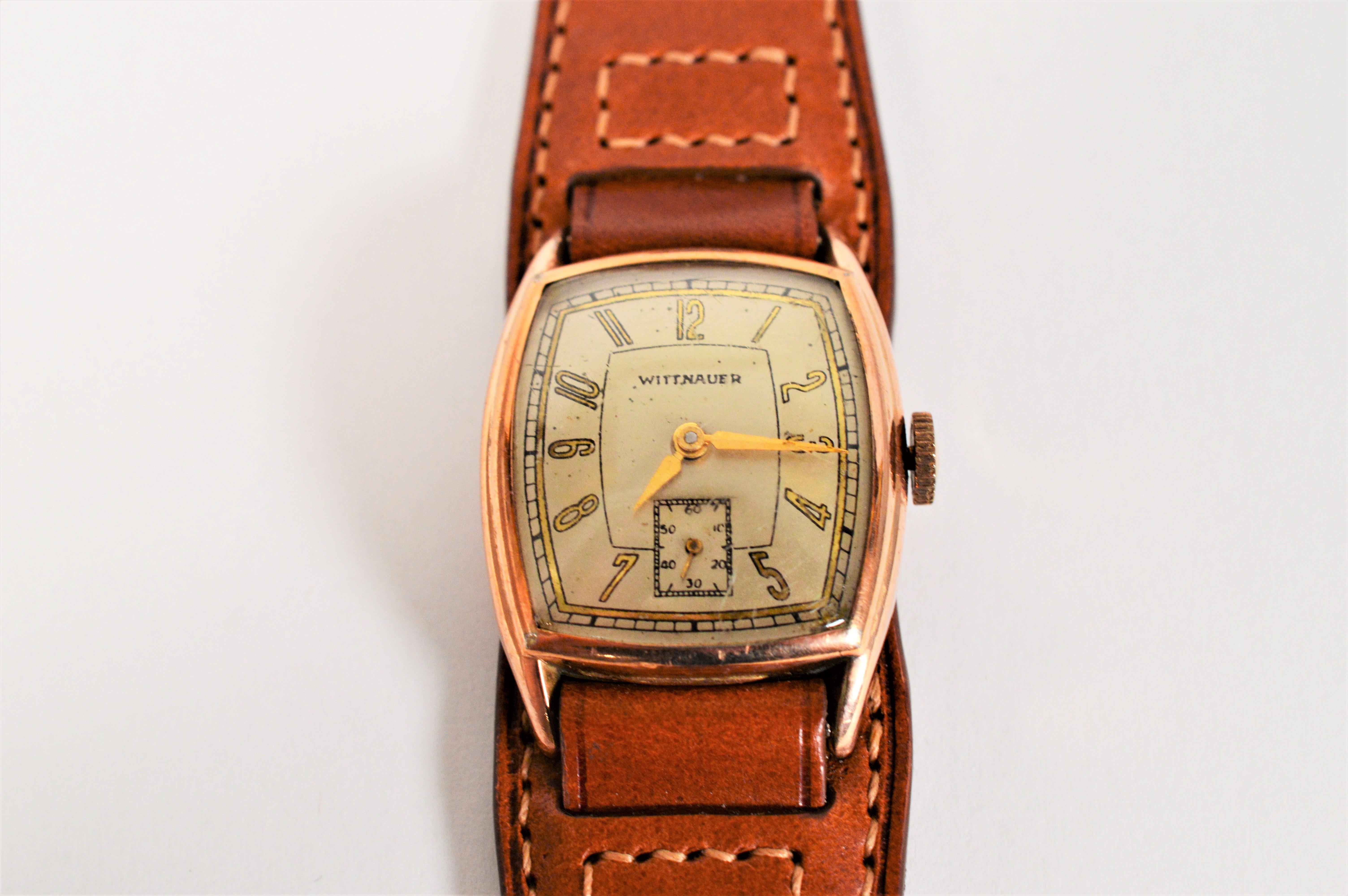 Pre War era, this fashionable vintage 10K rolled rose gold plated Wittnauer Wrist Watch begins another journey as a remarkable reclaimed timepiece.
Dated July 23, 1941 and made by the New York based Whittnauer Watch Co. With a convex crystal,  the