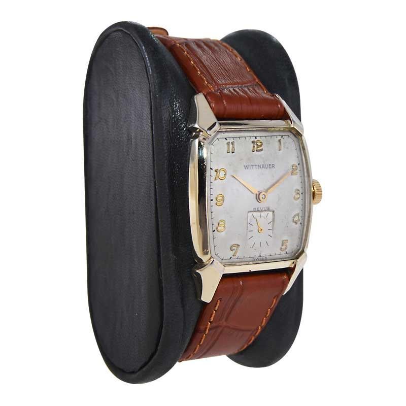 FACTORY / HOUSE: Wittnauer Watch Company
STYLE / REFERENCE: Art Deco
METAL / MATERIAL: Yellow Gold Filled
CIRCA / YEAR: 1950's
DIMENSIONS / SIZE: Length 38mm X Width 26mm
MOVEMENT / CALIBER: Manual Winding / 17 Jewels / Caliber 76 Revue
DIAL /