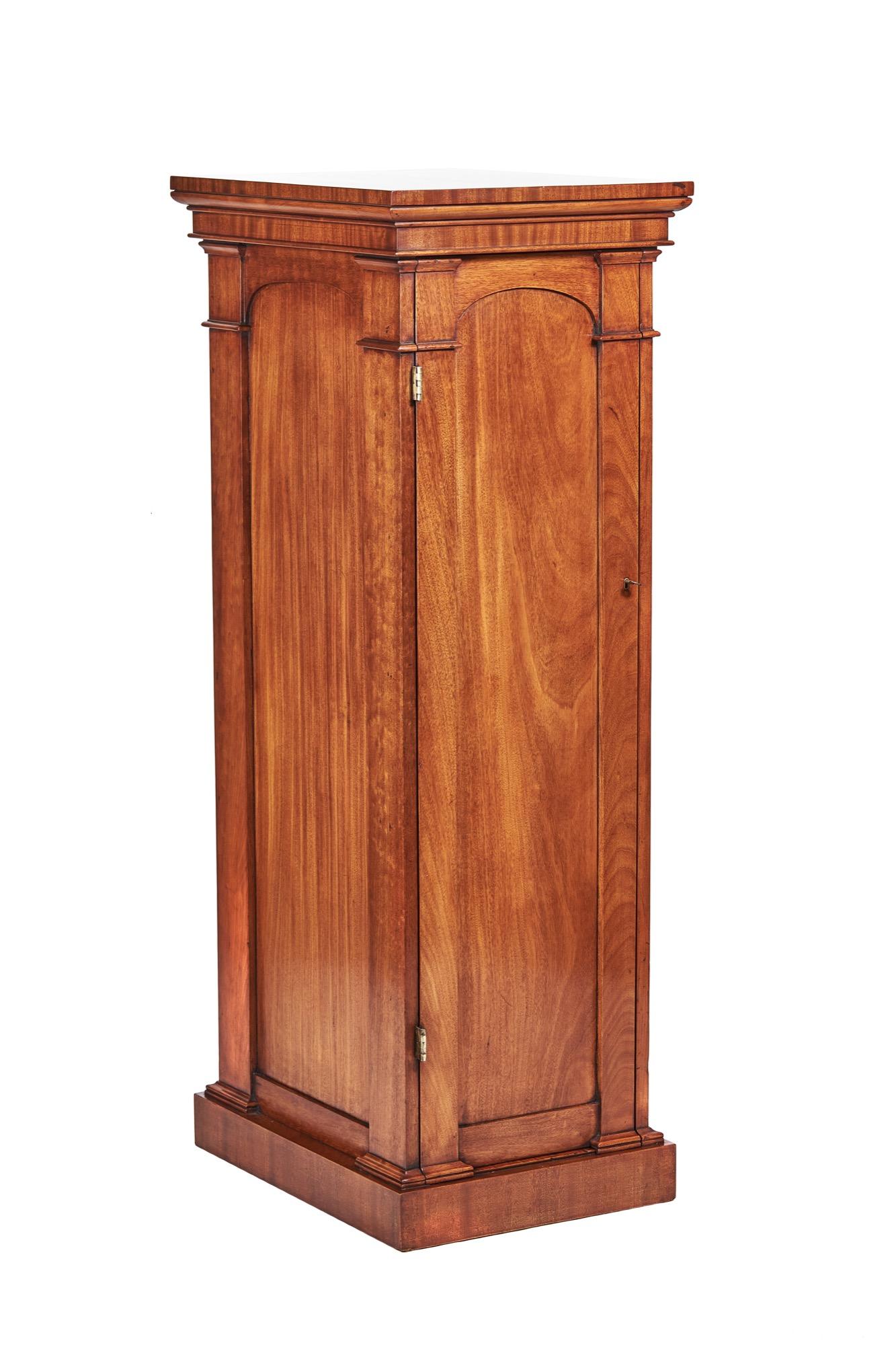 WIV period 7 drawer fitted tall pedestal cupboard, 
Mahogany top
4 Inset panel sides. The front with:
Single door with inset panel, working lock & key,
Opens to Reveal:
Fitted 7 mahogany Graduated Drawers, with brass inset ring handles,
Plinth