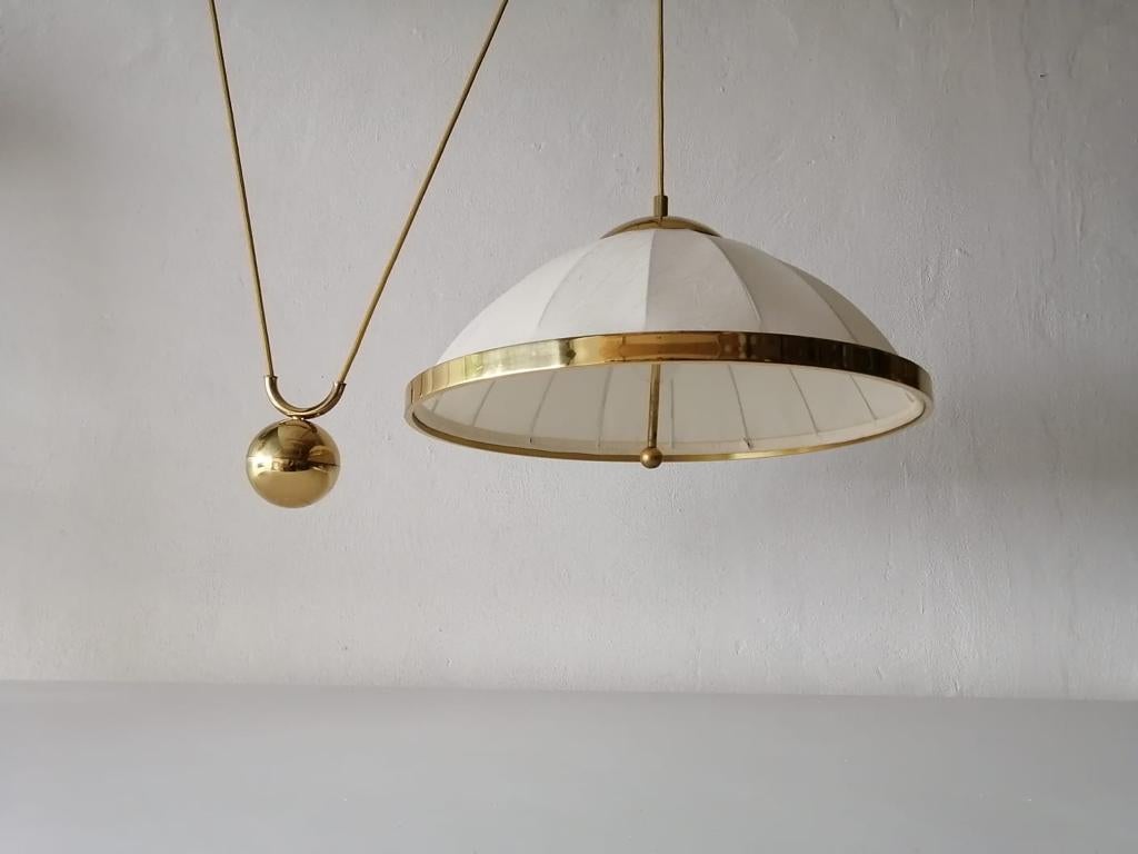 Mid-Century Modern Fabric and Brass Counterweight Pendant Lamp by WKR, 1970s, Germany