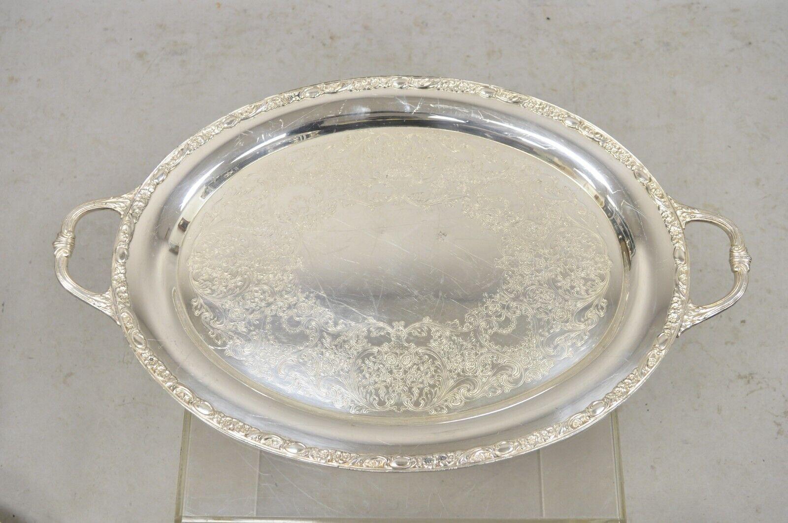 WM Rogers & Son Victorian Rose 1982 Silver Plated Oval Serving Platter Tray. Circa Late 20th Century. Measurements: 1.5