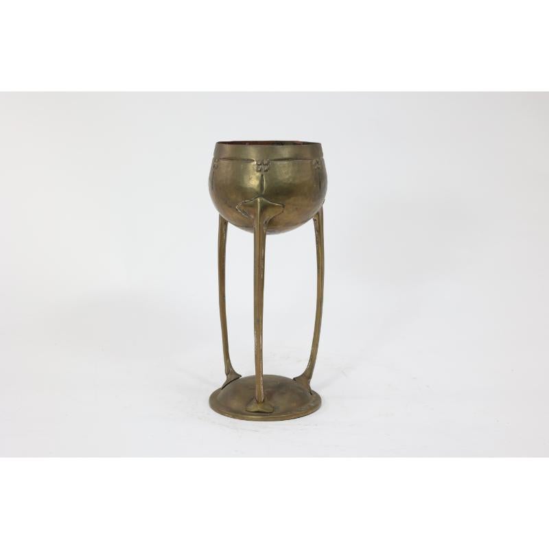 Arts and Crafts WMF. A hand beaten brass chalice, the bowl raised on three organic supports. For Sale