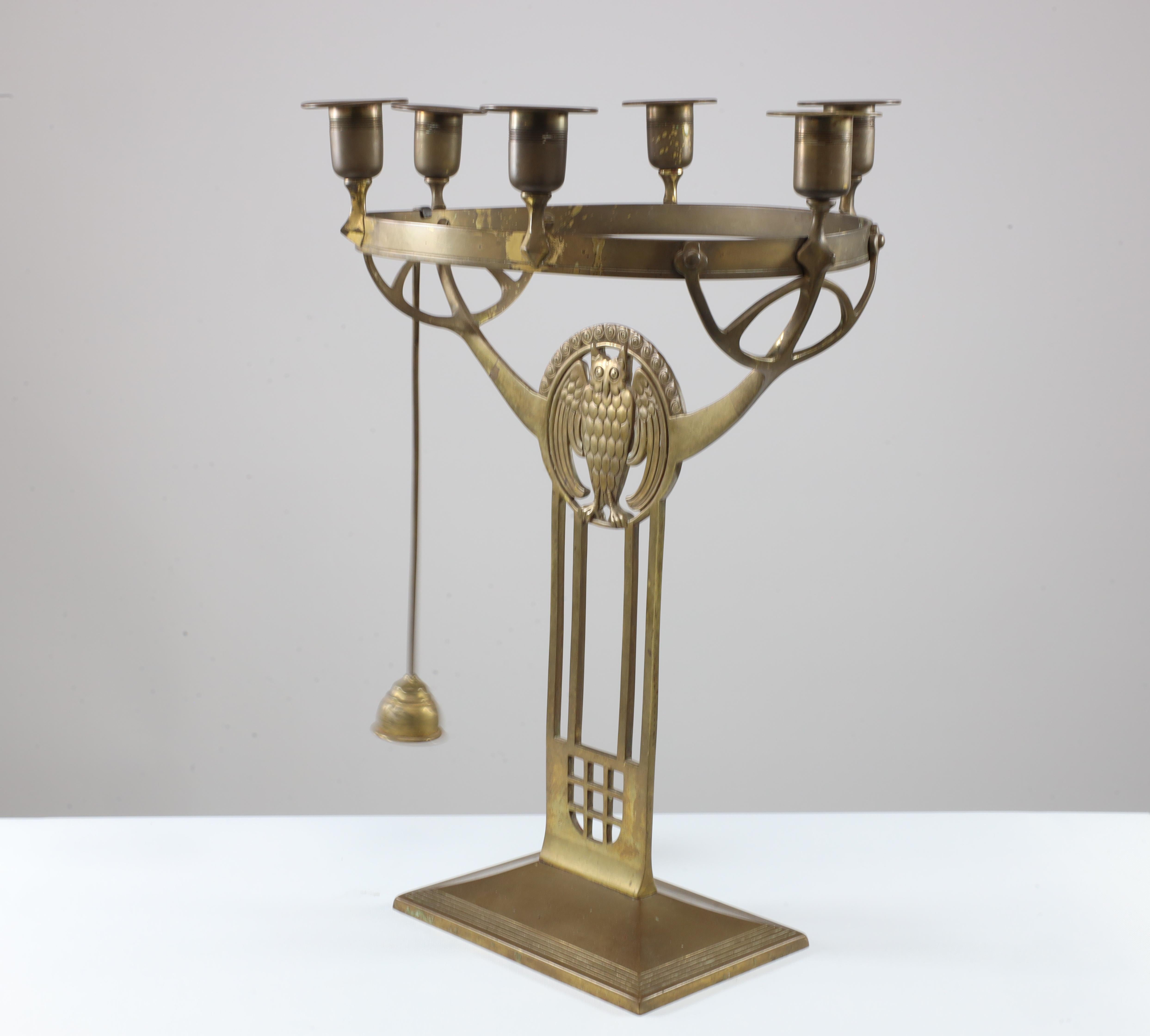 Austrian WMF An Art Nouveau candelabra with an owl & 6 sconces to the main circular ring. For Sale