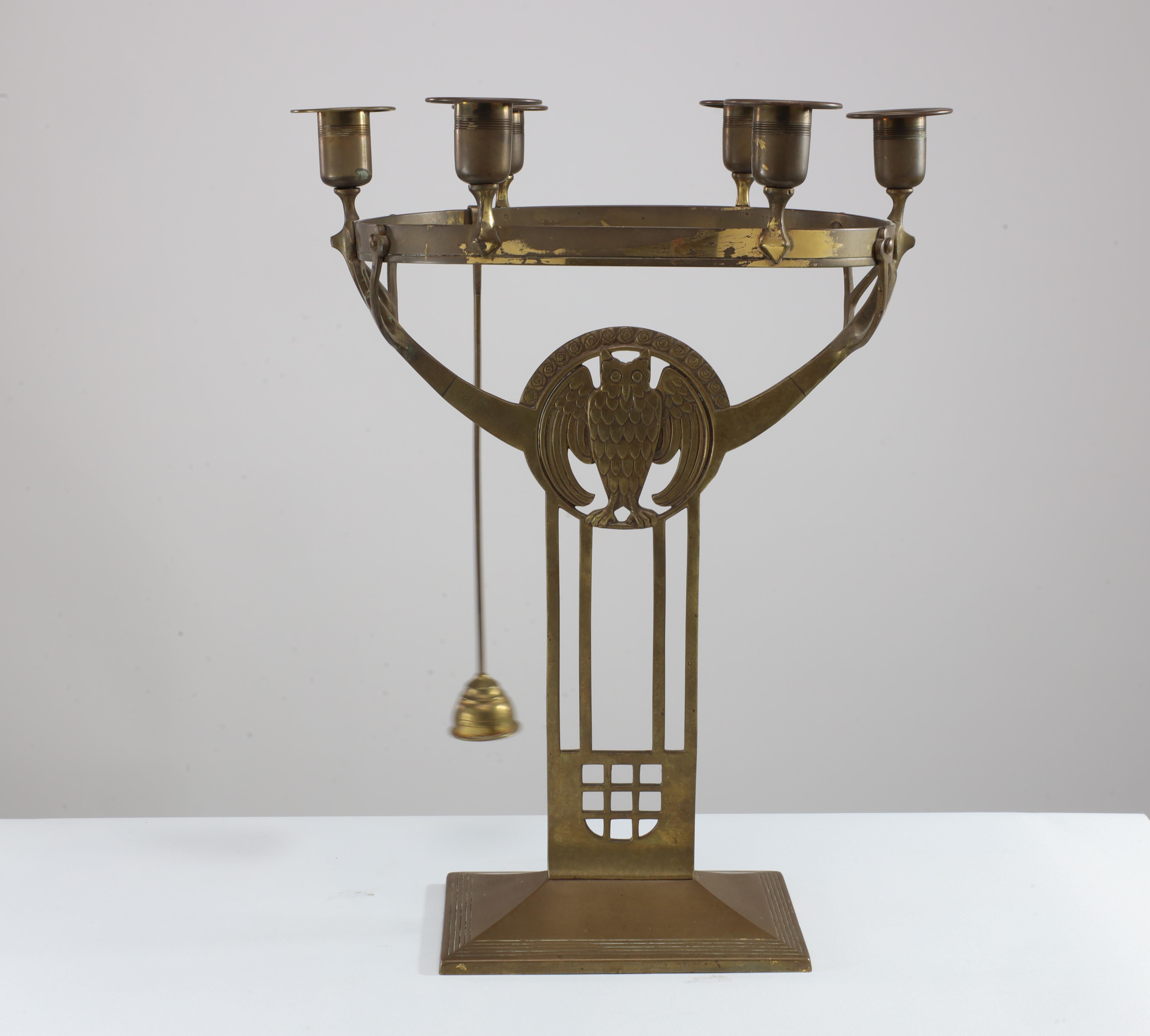 Early 20th Century WMF An Art Nouveau candelabra with an owl & 6 sconces to the main circular ring. For Sale