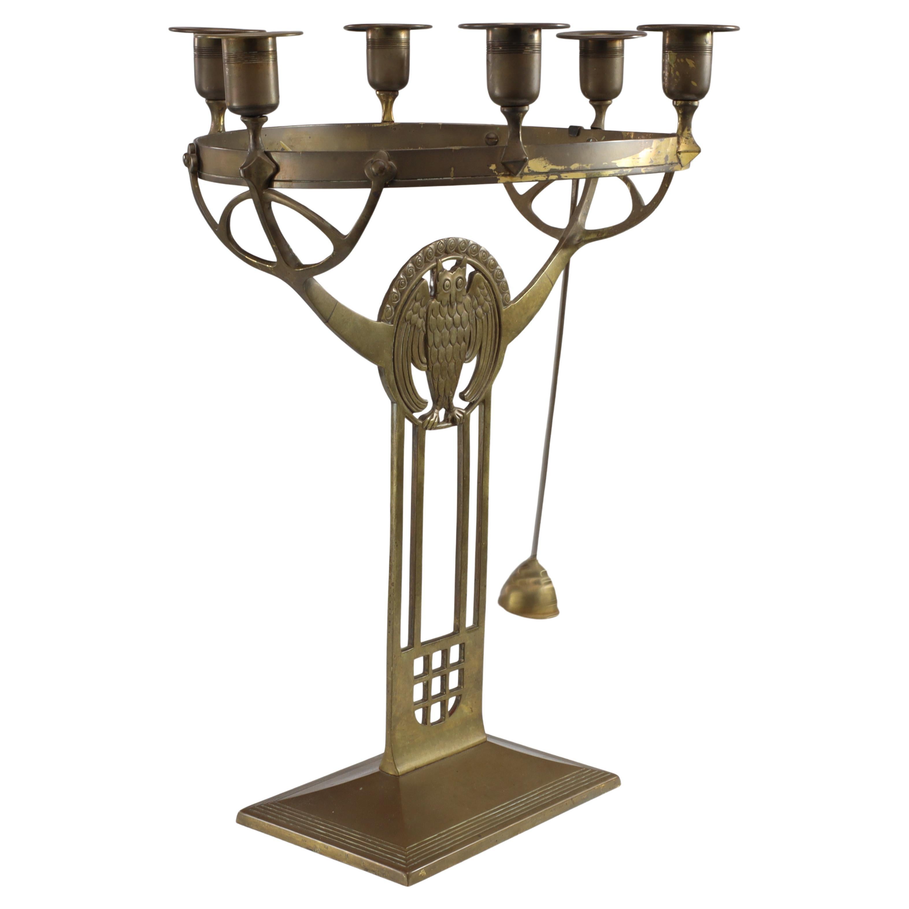 WMF An Art Nouveau candelabra with an owl & 6 sconces to the main circular ring. For Sale