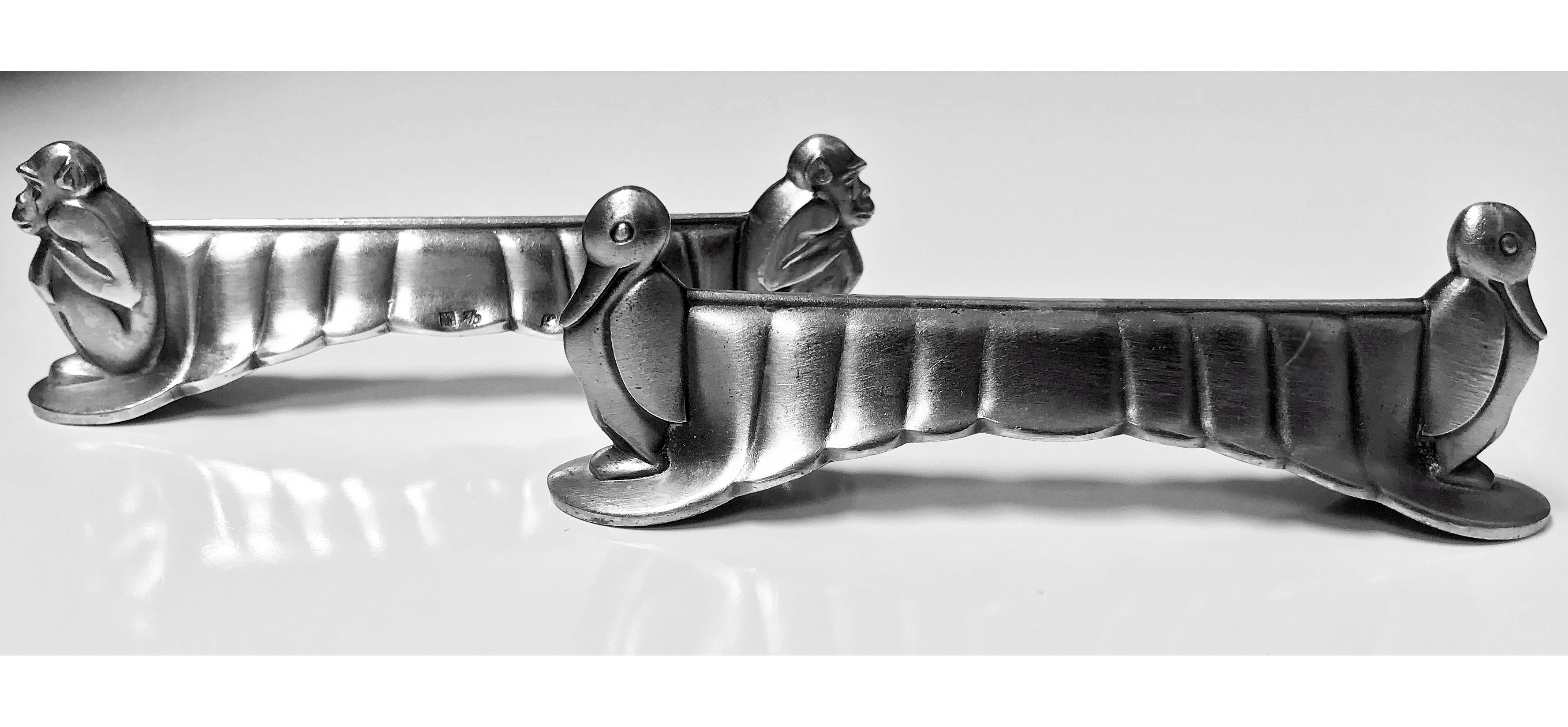 Set of 6 WMF Art Deco silver plate animal knife rests, Germany, circa 1920. The knife rests depicting monkey, frog, pelican, duck, dash hound and pig respectively. WMF I/0 marks. Length: 9.7 cm.