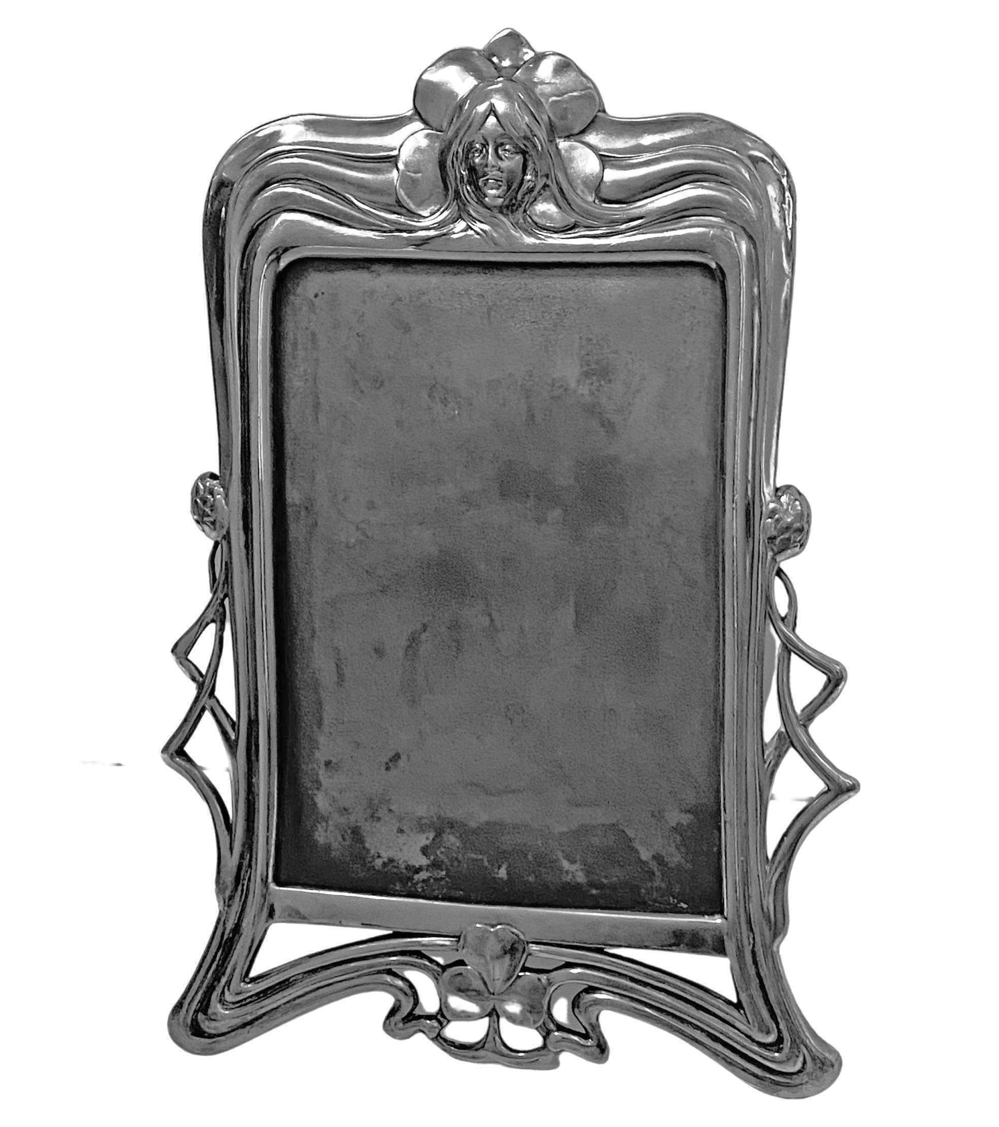 WMF Art Nouveau Jugendstil Britannia metal photograph frame, Germany C.1900, WMF. Ref No 90 page 304 WMF 1906 catalogue. WMF marks B 1/0 beehive B and export mark. Overall measurements: 8 3/4 x 5 3/4