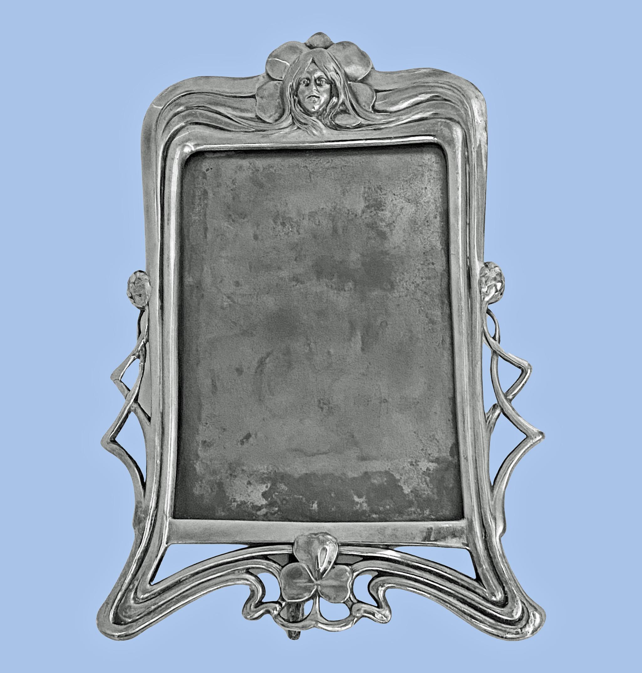 WMF Art Nouveau Jugendstil pewter photograph frame, Germany C.1900, WMF. Ref No 90 page 304 WMF 1906 catalogue. WMF marks B 1/0 beehive B and export mark. Overall measurements: 8 3/4 x 5 3/4