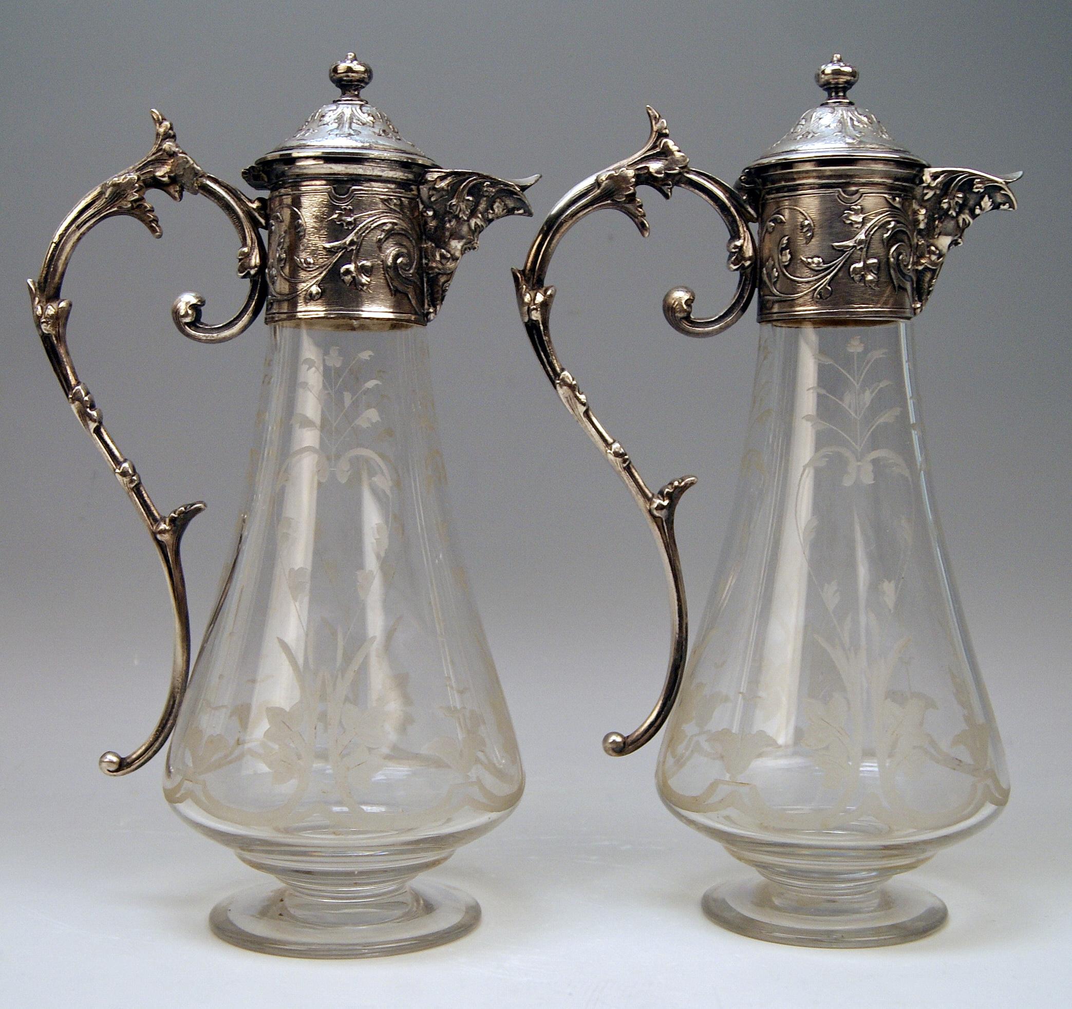 WMF Art Nouveau pair of claret and water jugs (pitchers) / silver plated (Germany).

Manufactory: WMF Germany Geislingen
Dating: Made circa 1900
Material: Metalware, Britannia Metal (Silver-plated)
Technique: Electrotype Metalware