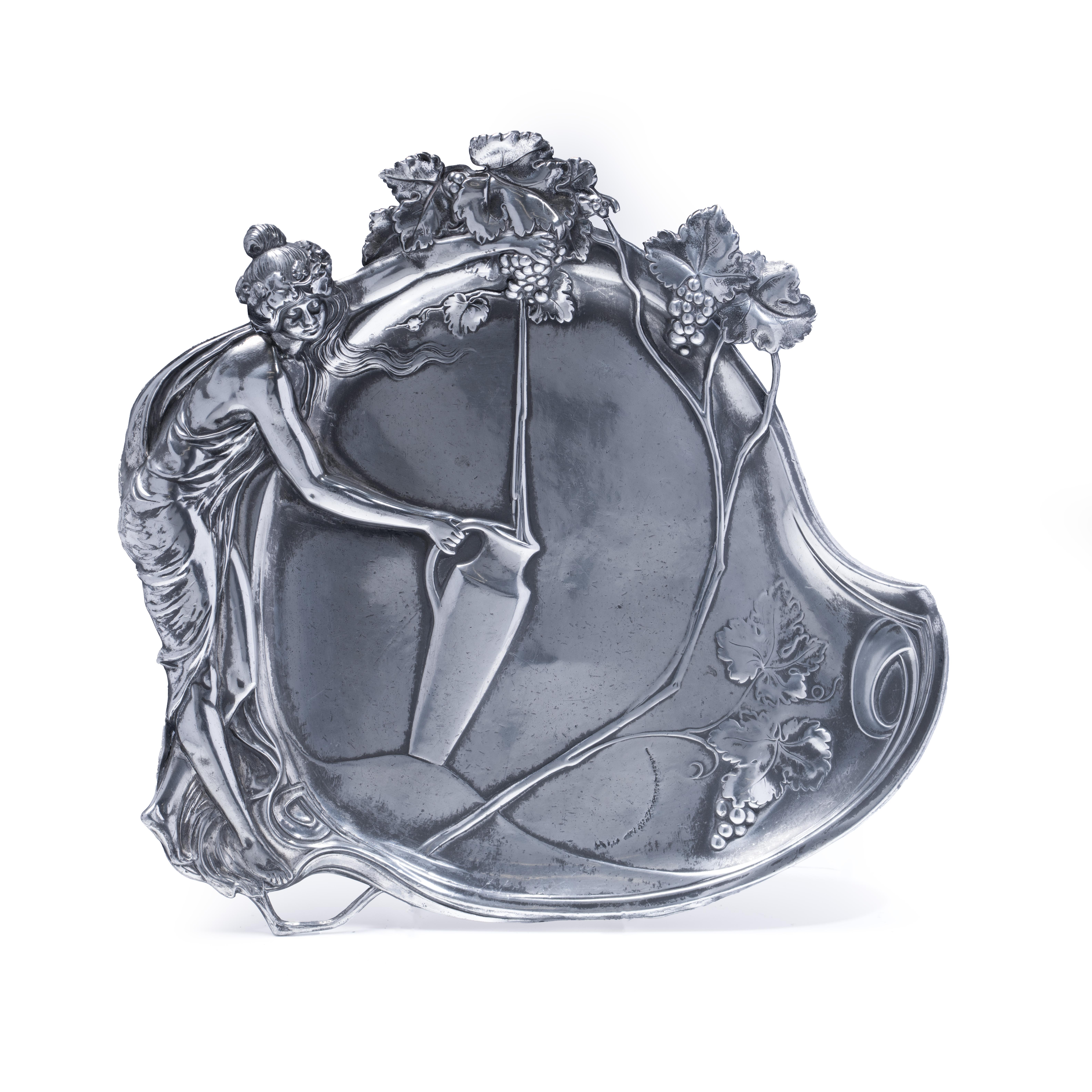 An exquisite Art Nouveau silver-plated tray by WMF (Württembergische Metallwarenfabrik), dating to circa 1900. This visiting card or decorative platter features an elegant high-relief depiction of Diana the Huntress—gracefully poised as she gathers