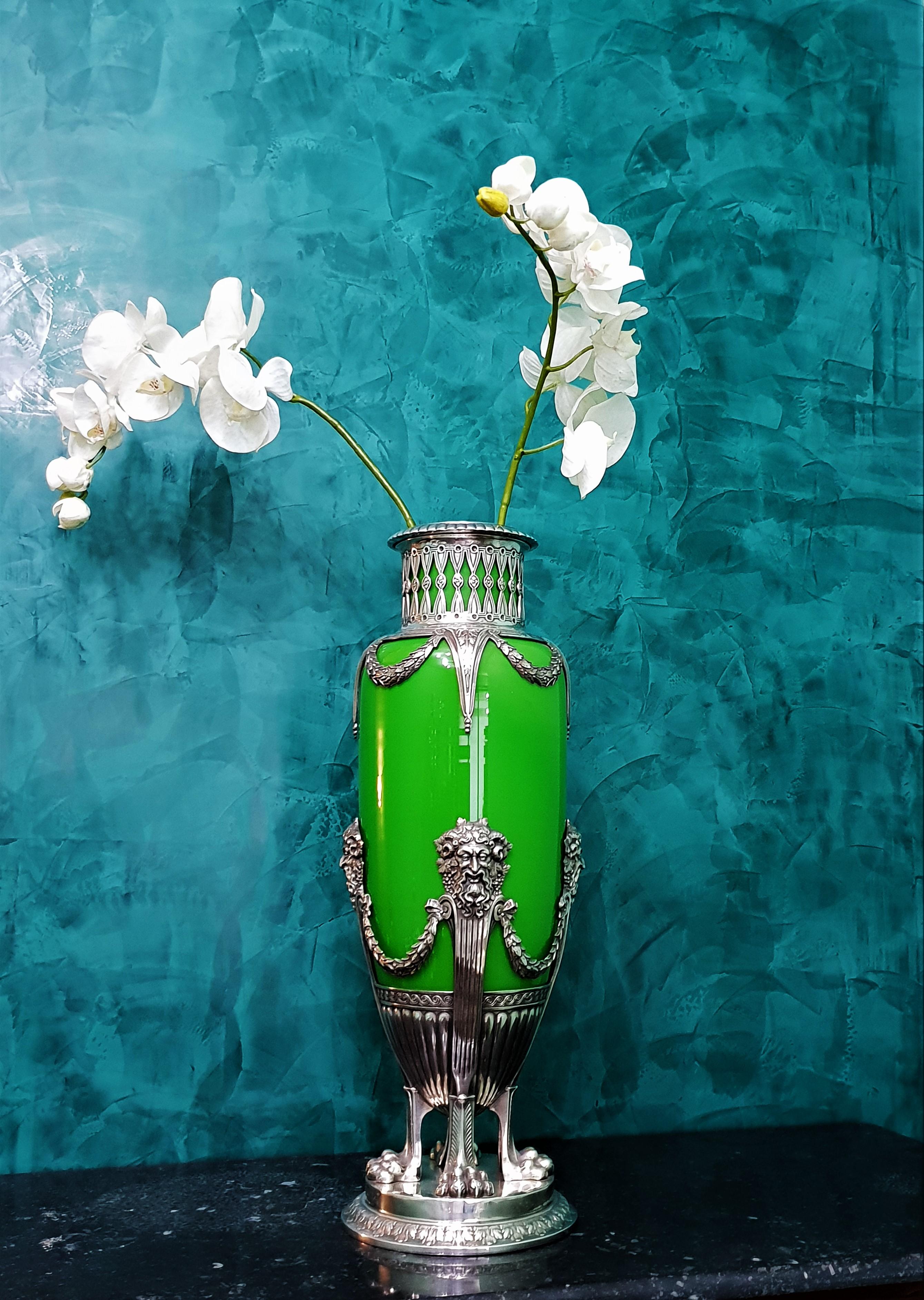 Splendid flower vase by WMF (Württembergische Metallwarenfabrik) founded in 1853 in geislinge, Germany.
This particular vase is realized in opaline green glass and sliver plated pewter.
Fully Art Deco style and realized in the early years of 20th