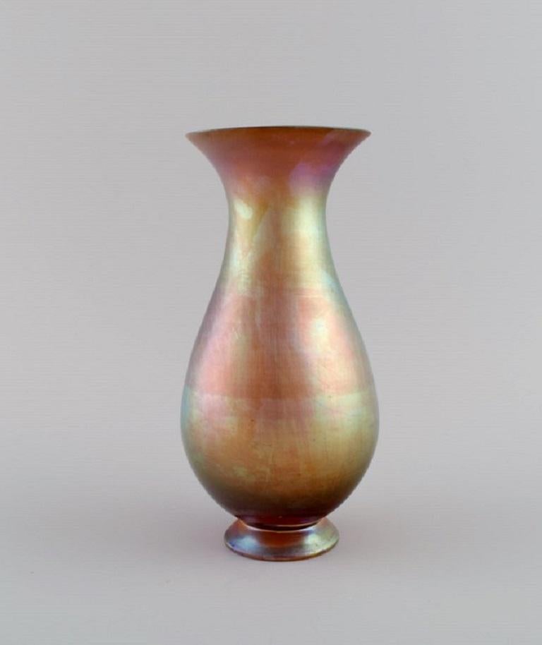 WMF, Germany. Vase in iridescent myra art glass. 1930's.
Measures: 19.5 x 9.5 cm.
In excellent condition.