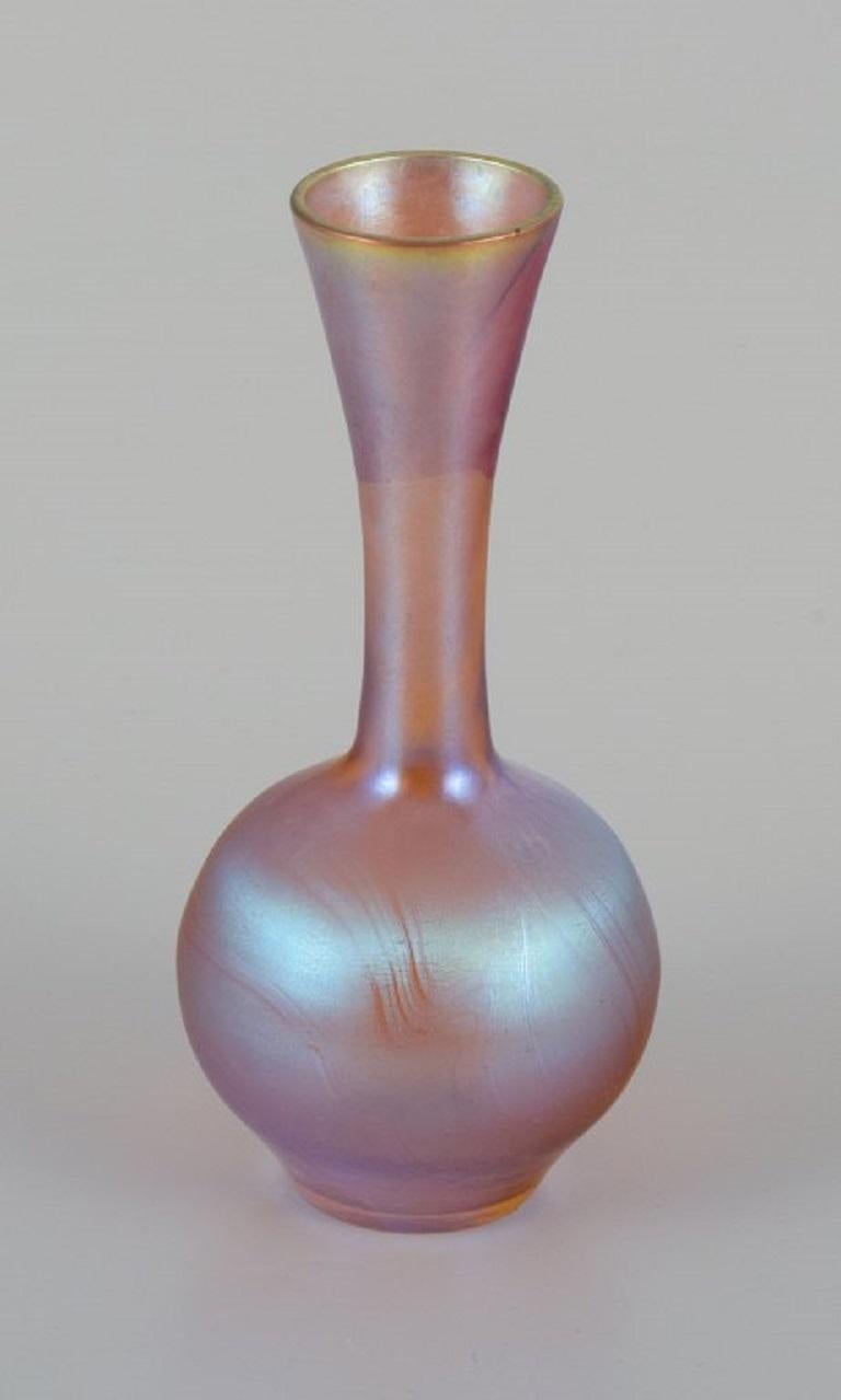 WMF, Germany vase in iridescent Myra art glass.
1930s.
In excellent condition.
Dimensions: D 6,0 x H 14,0 cm.