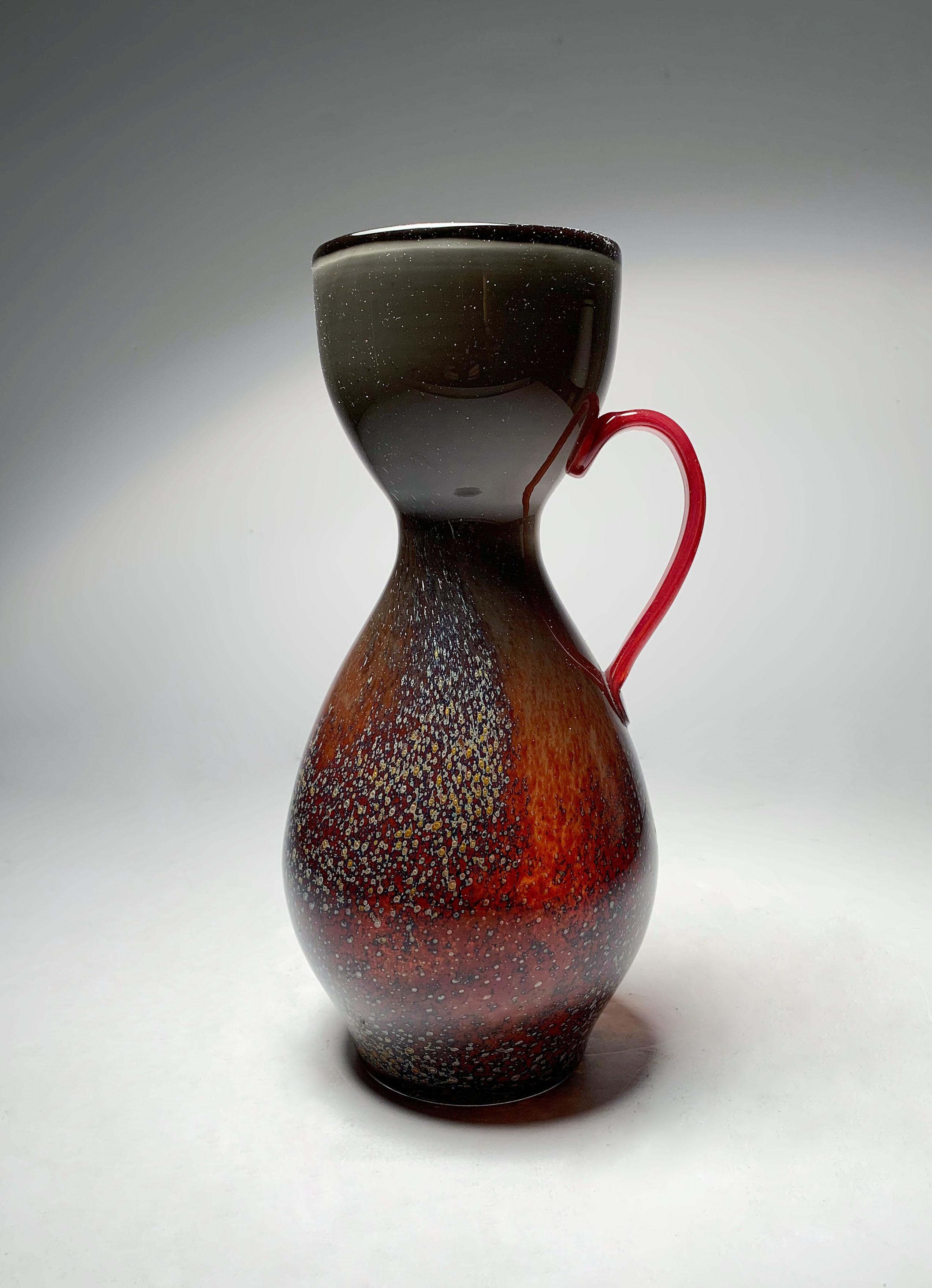 A pretty rare form of WMF Glass vase with red handle by Karl Wiedmann. Germany. 