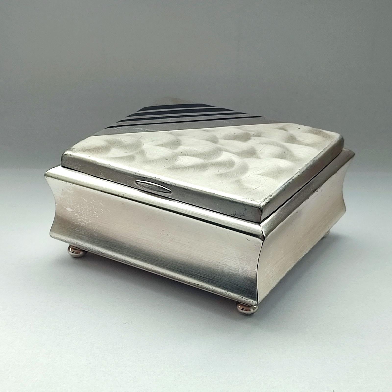 Mid-20th Century WMF Ikora Art Deco Silver Plate and Black Enamel Cigarettes Box with Lid For Sale