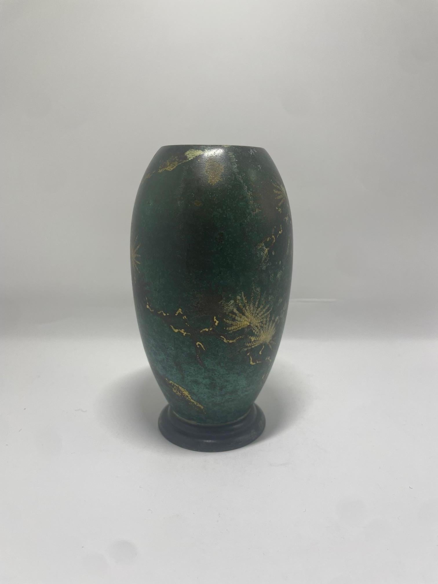 Beautiful turquoise green patinated metal vase made by WMF Ikora, Germany in the 1930's. 

