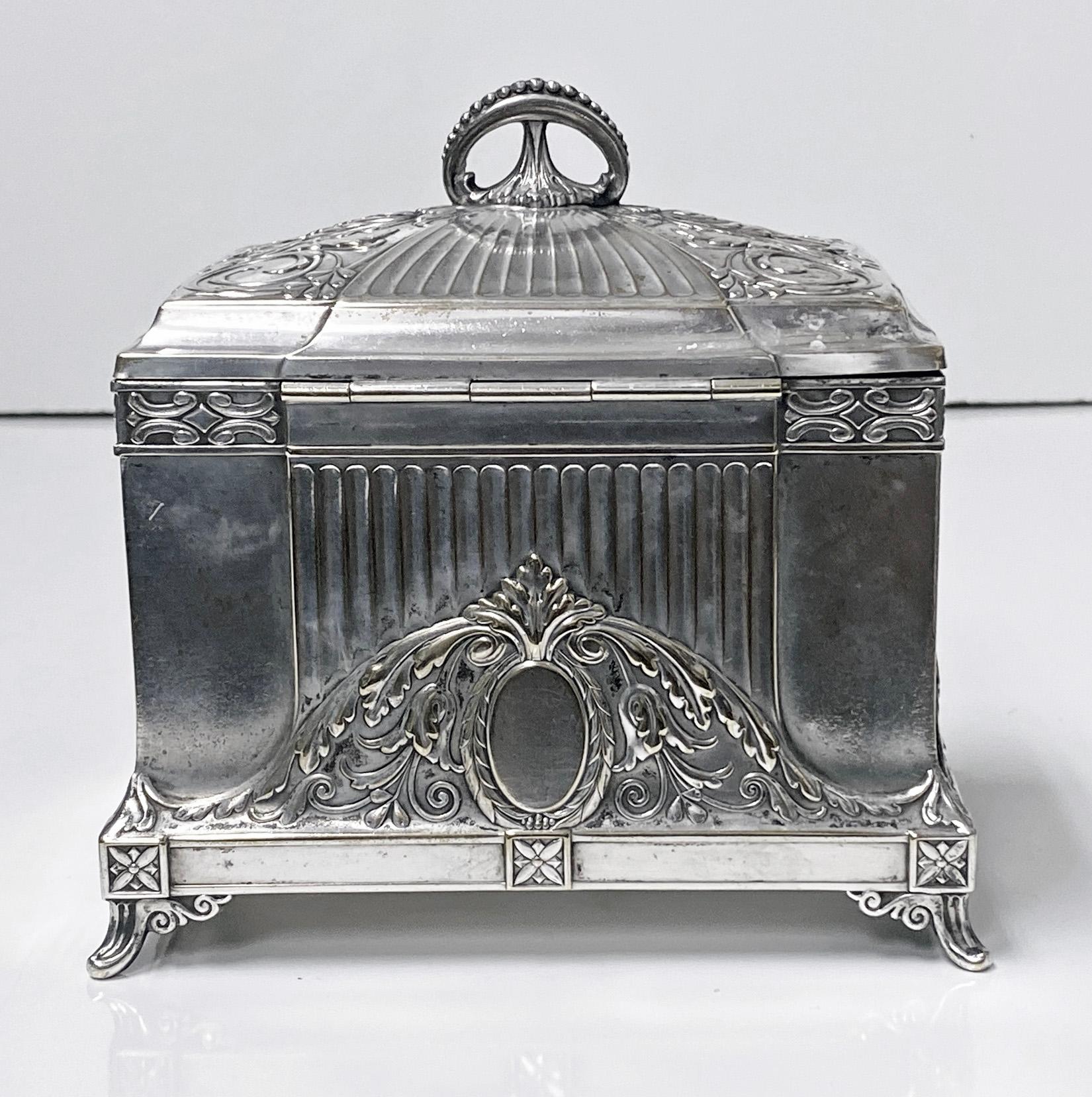 WMF Jugendstil secessionist silver plate jewelry box, Germany, circa 1900. The box of rectangular shape on four turned stylised supports, conforming in style to cornices and decoration of sides and concave dome shape hinged cover with hemispherical
