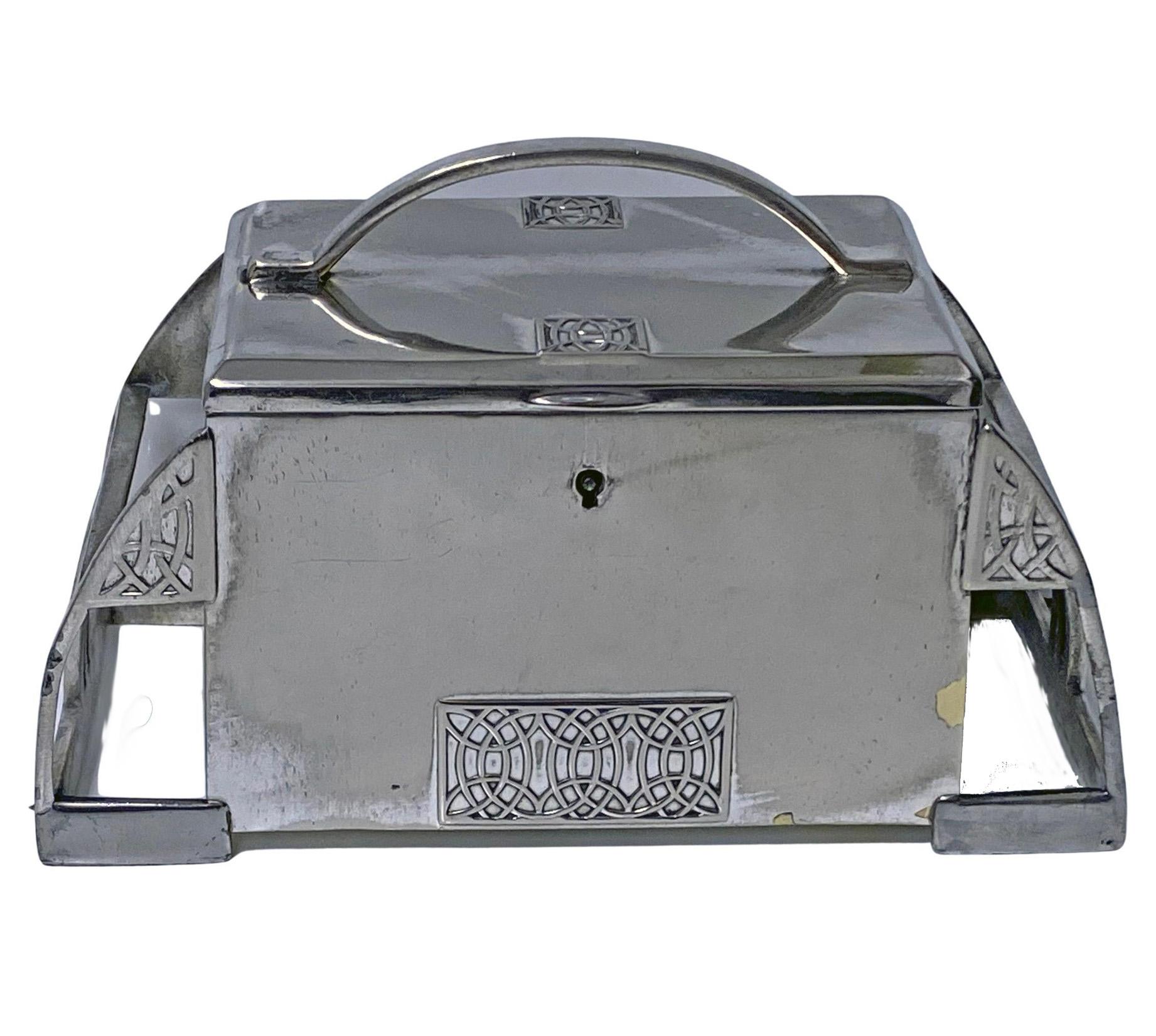 WMF Jugendstil secessionist silvered pewter Box Germany, circa 1900. The box of a rare design, rectangular arch like shape \hinged cover with hemispherical handle; the sides of a geometric bracket divisional form. The box decorated with arts and
