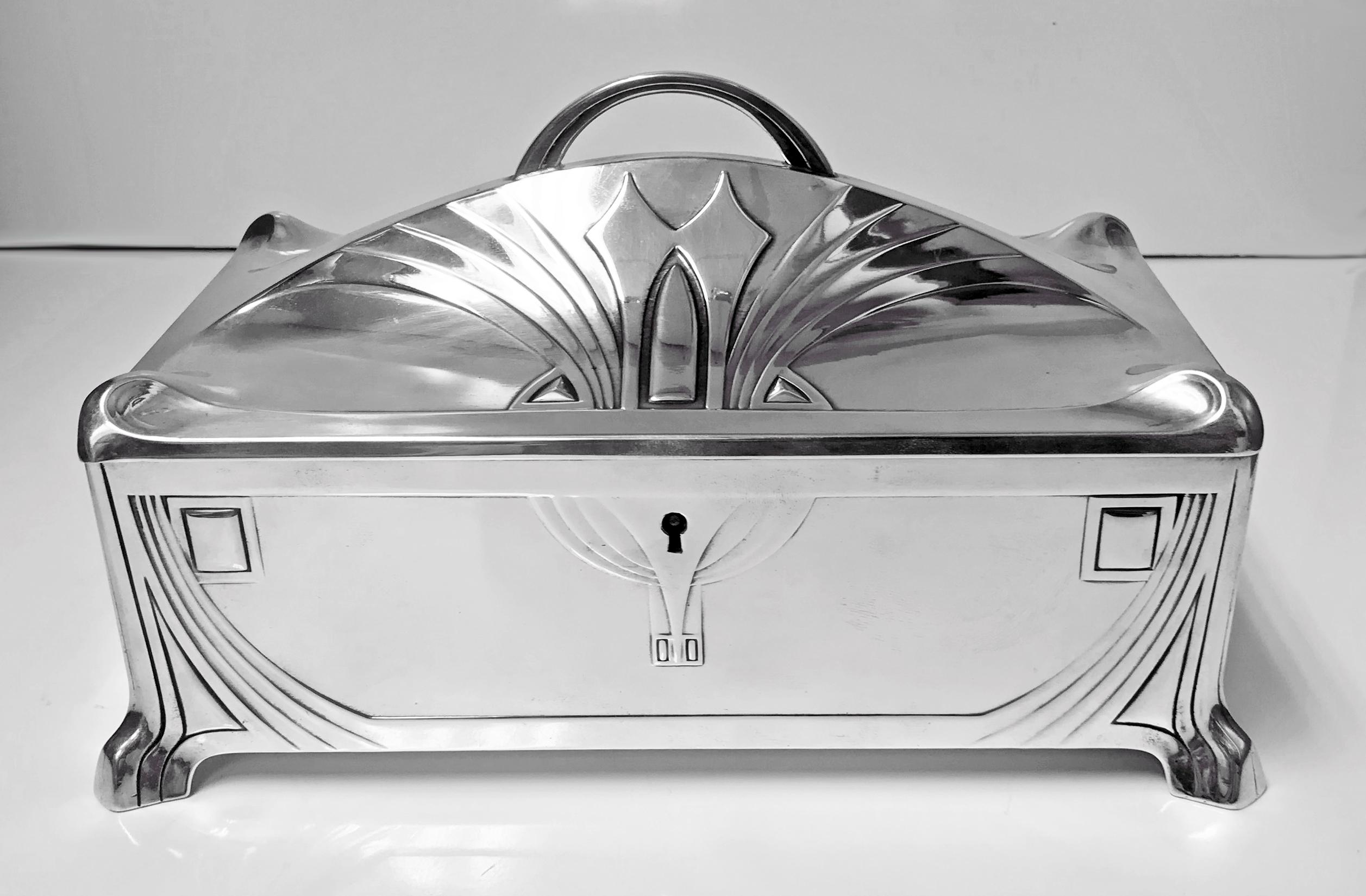 WMF Jugendstil Secessionist Silver plate large Jewellery or Cigar Box, Germany, C.1906. The box of rectangular shape on four turned stylised supports, conforming in style to cornices and decoration of sides and concave dome shape hinged cover with