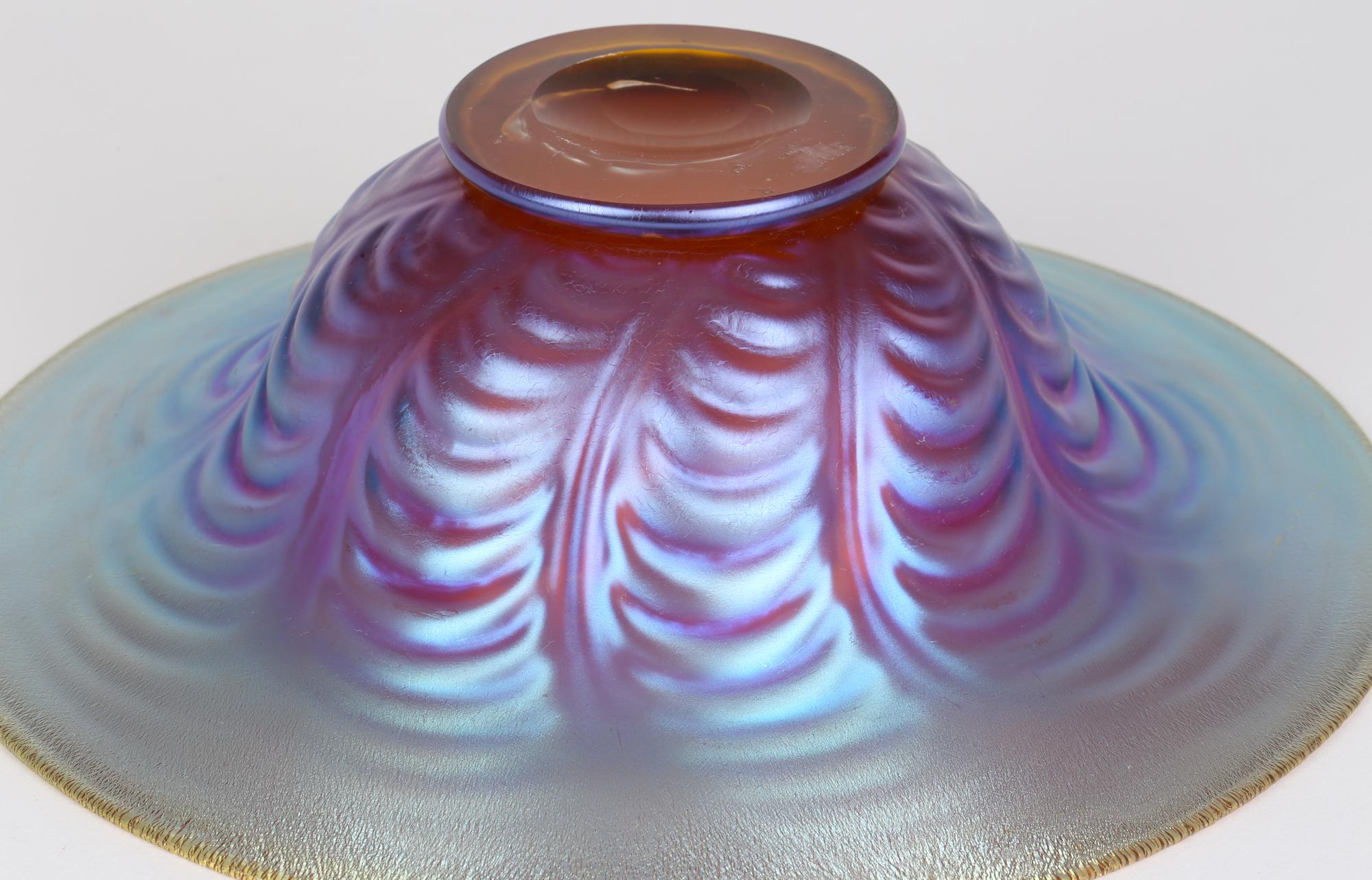 Stunning German Art Deco Myra Kristal art glass bowl by Karl Wiedmann for WMF (Würtemburgische Metallwaren Fabrik) and made between 1926 and 1936. This large and striking hand-blown amber glass bowl stands on a round narrow foot with relief molded