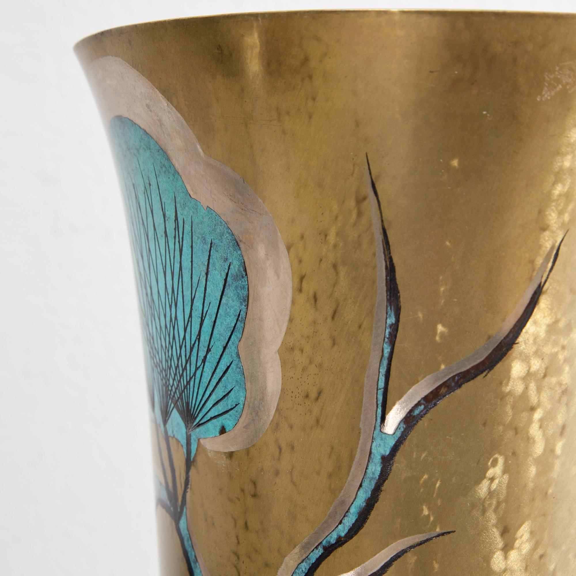 Large WMF vase with blue décor on gold ground.