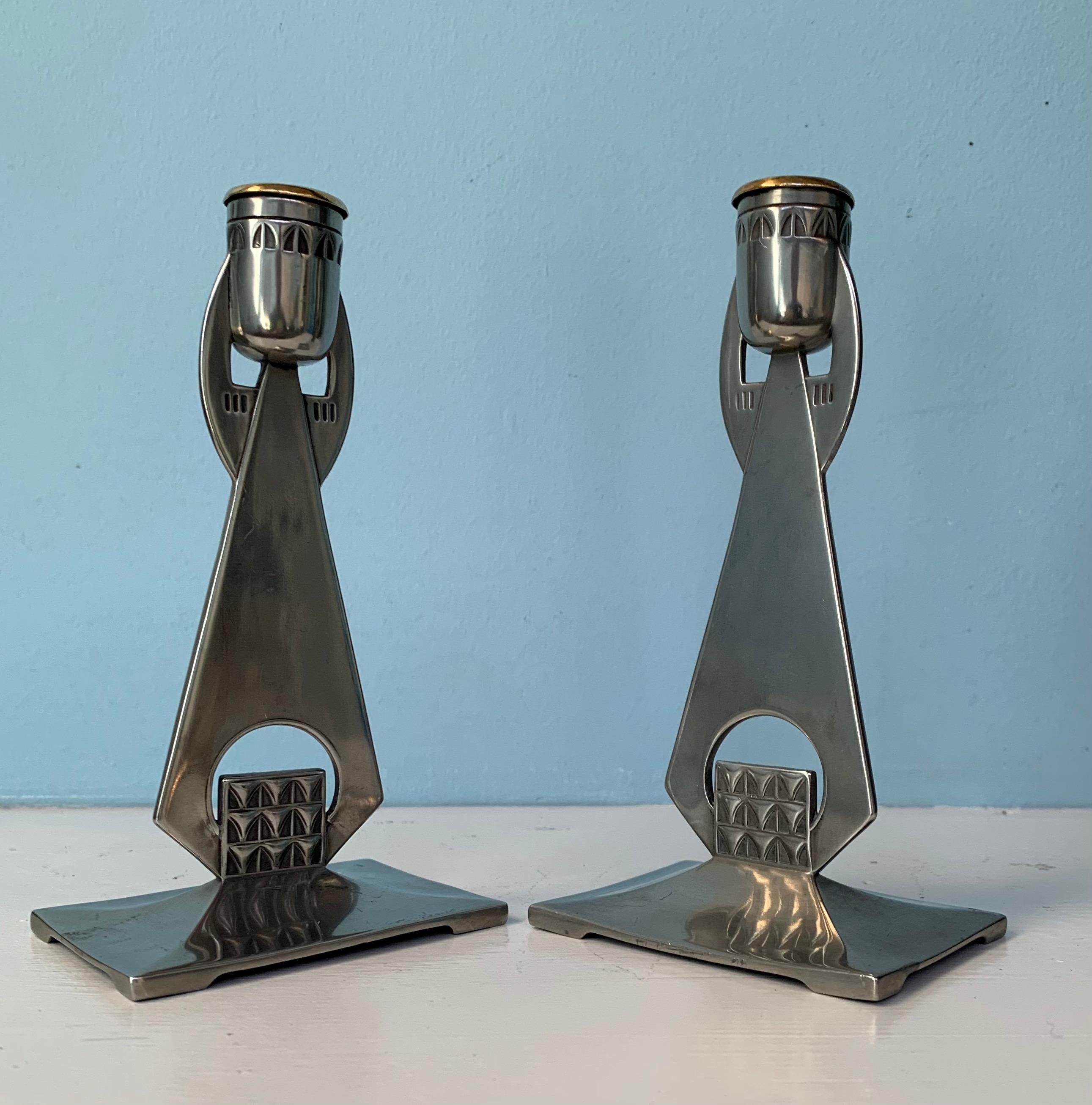 Lovely pair of Art Nouveau candlesticks in the secessionist style made in the early 1900s.