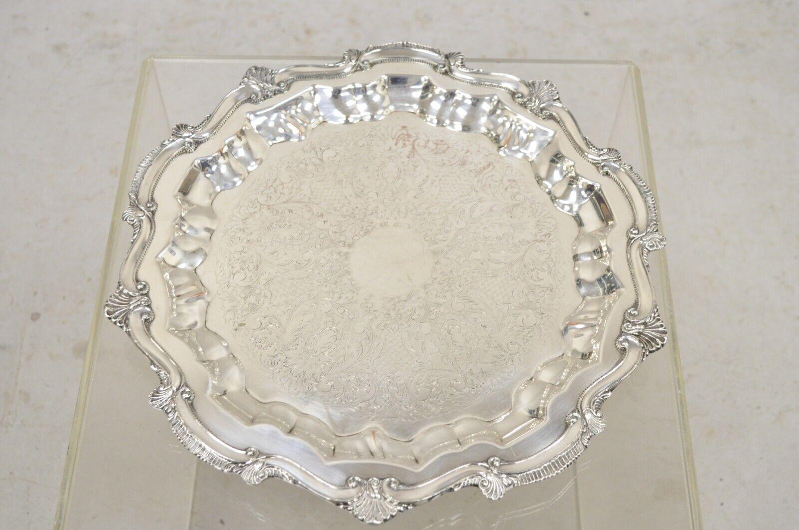 WNS Blackinton Chippendale 1457 Silver Plated Round Scalloped Platter Tray. Circa  Late 20th Century Measurements: 1.25