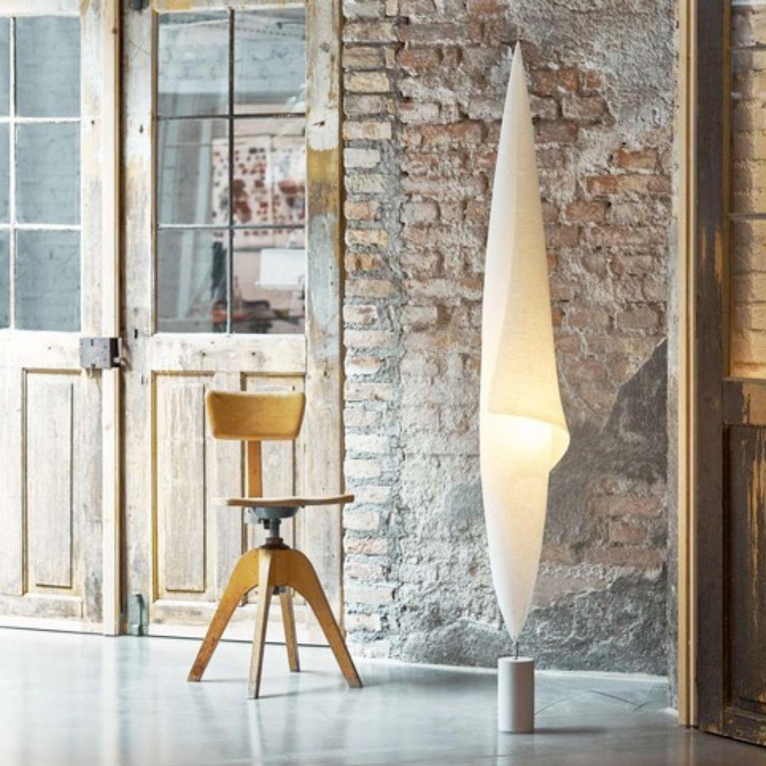'Wo-Tum-Bu 1' Japanese paper & hand poured concrete floor lamp for Ingo Maurer

Designed and produced by Ingo Maurer, one of the most celebrated German lighting icons since 1966. With imagination, creativity and technical prowess, Maurer’s lamps
