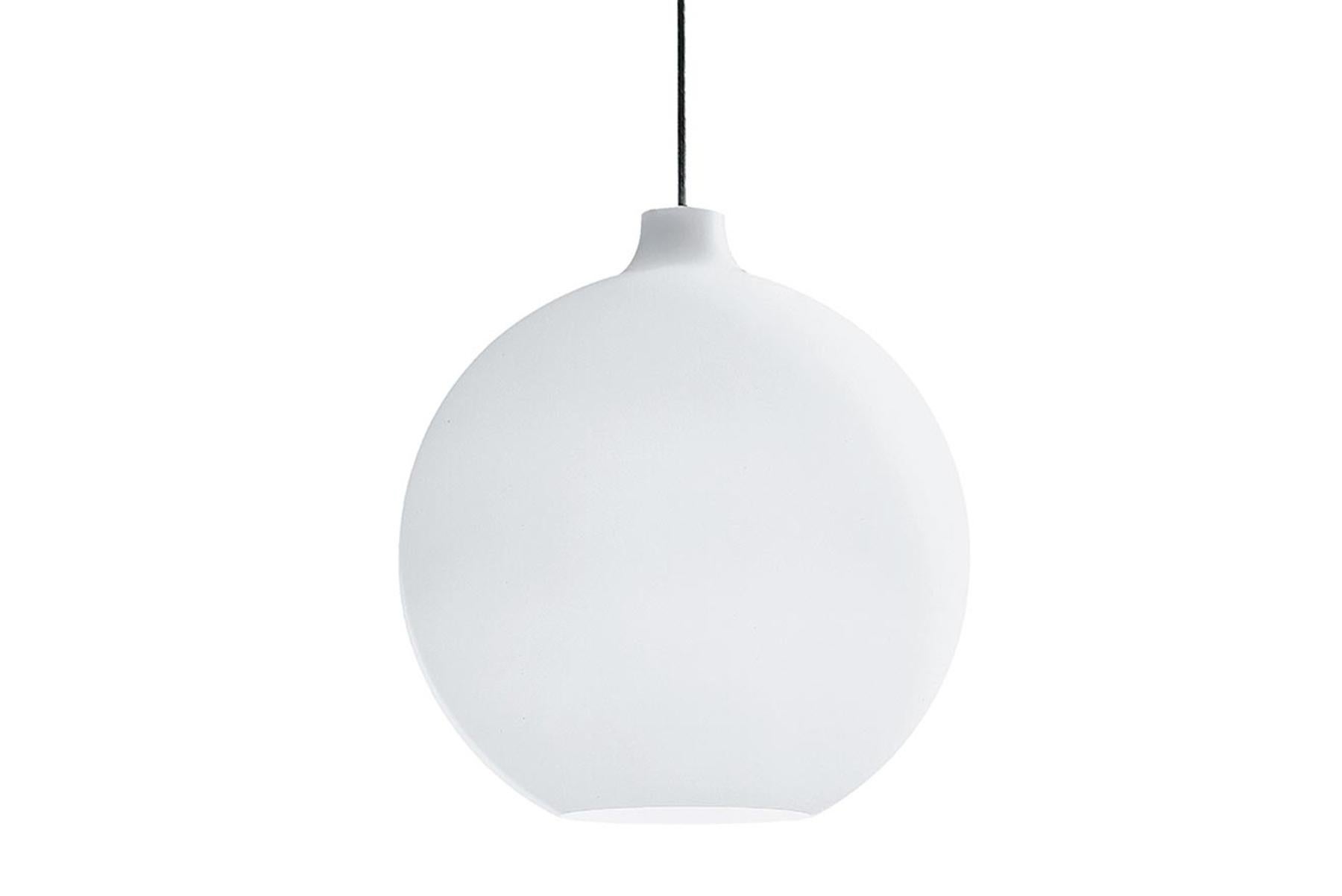 The fixture provides uniform, general and diffuse illumination. The opening at the bottom of the glass produces downwards directed light. The quality of the glass ensures that the fixture is evenly lit. Vilhelm Wohlert designed the Wohlert pendant
