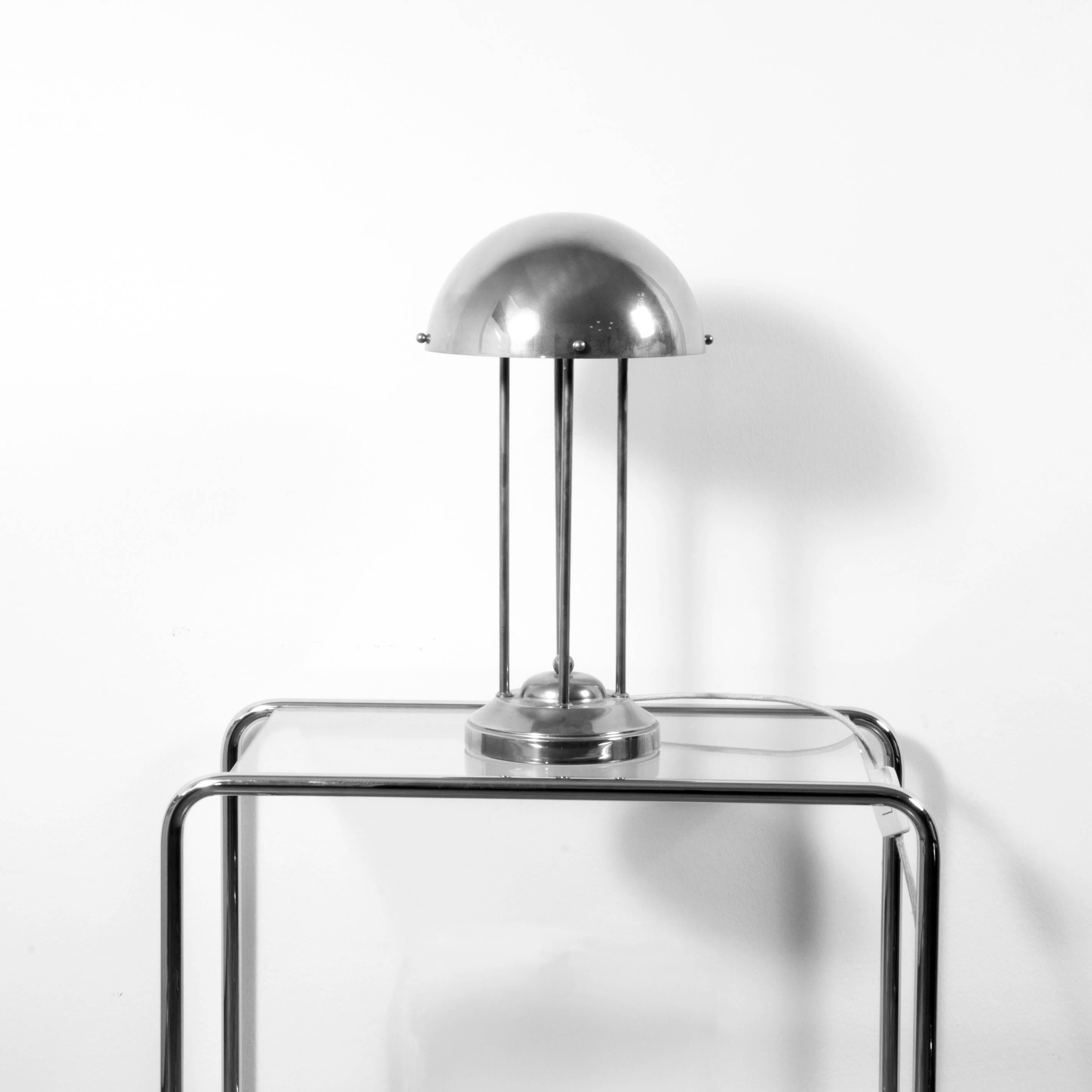 Formed of steel and modelled after the lighting designed by Josef Hoffmann for the Villa Henneberg, a private residence on the Hohen Warte in Vienna, Austria between 1900 and 1904, this lamp was made for the local Austrian market in the 1960s. The