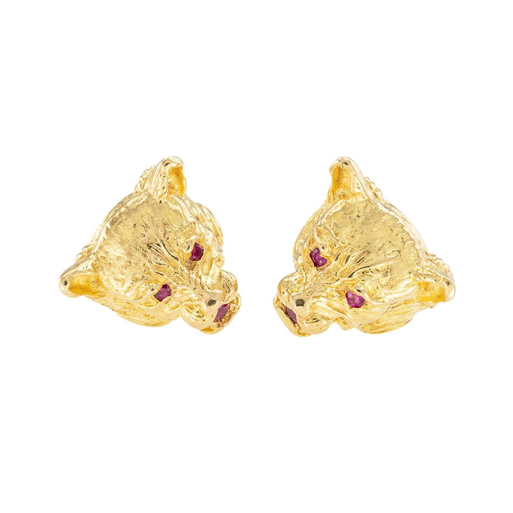 Wolf Head ruby and yellow gold cufflinks circa 1960.  

The facts you want to know are listed below.  Read on.  It is remarkably short, simple, and clear.  Do contact us right away if you have additional questions. 

SPECIFICATIONS:

GEMSTONES:  six