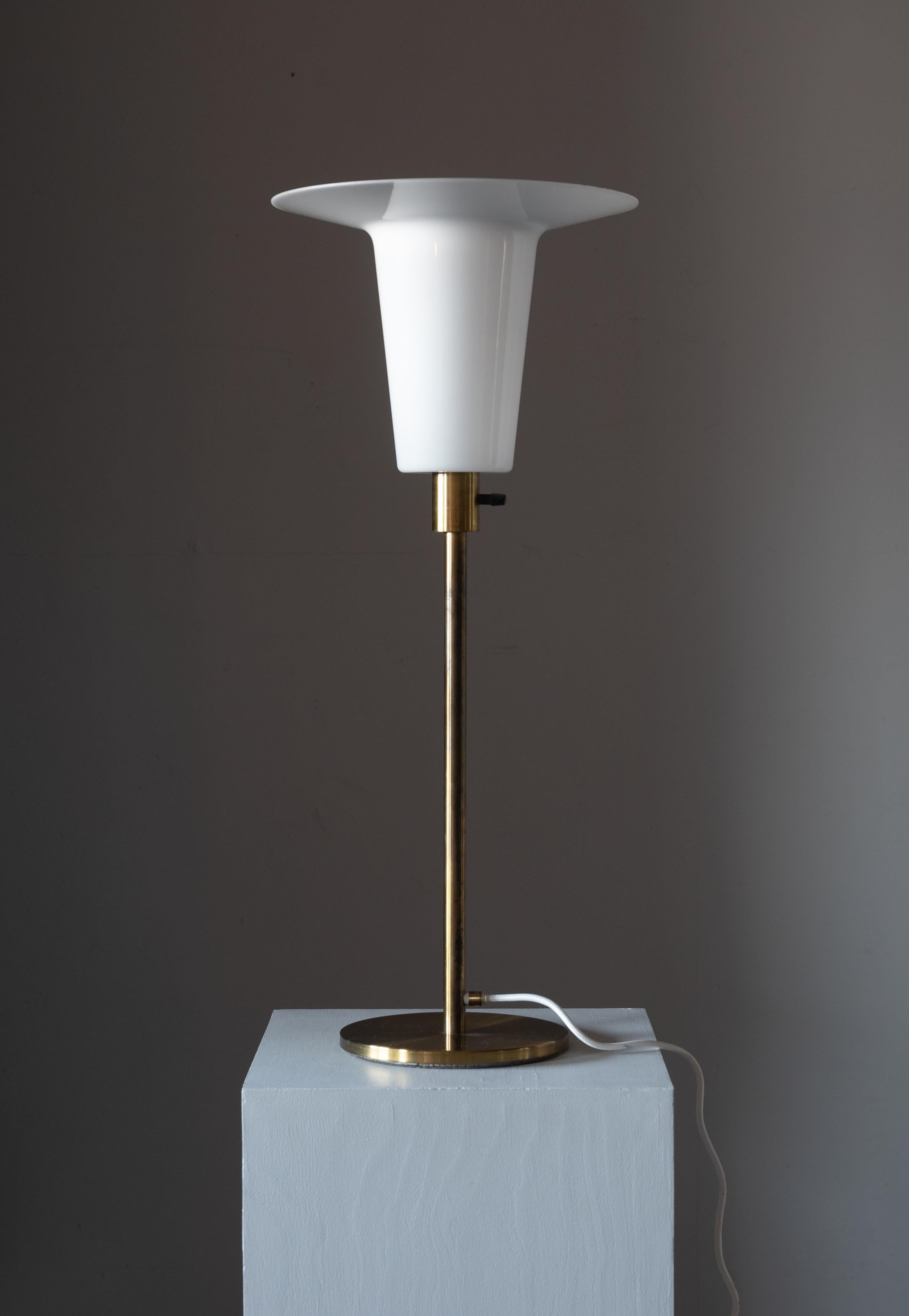 A large brass table lamp. Designed by Wolfgang Haase, for Luxus, Sweden, 1967. Labeled.

Original acrylic diffuser.

Other designers of the period include Axel Einar Hjorth, Roland Wilhelmsson, Charlotte Perriand, Pierre Chapo, and Yasha Heifetz.