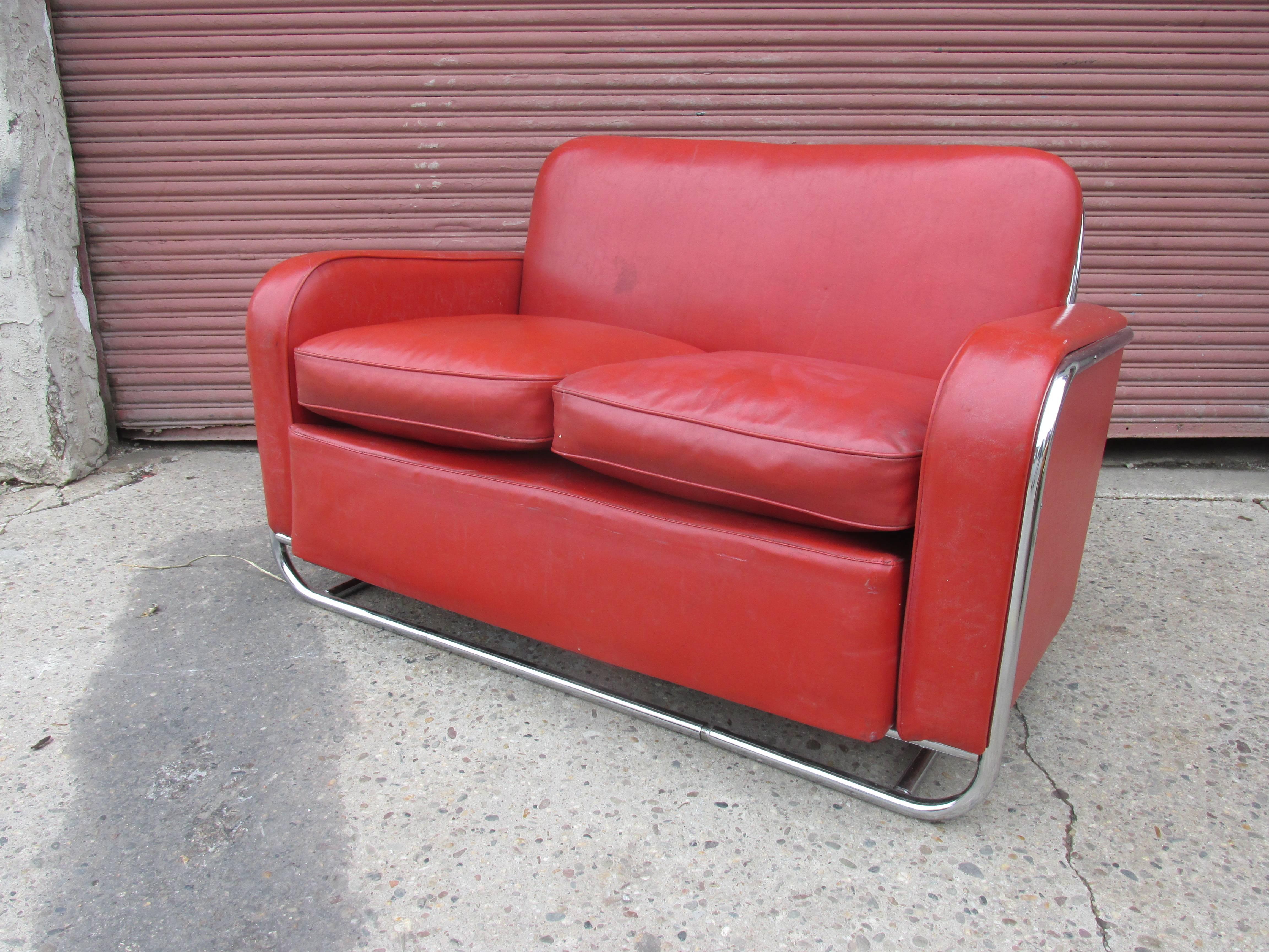 Wolfgang Hoffman Howell Furniture chrome loveseat. Mid 1930s design, seldom seen in the loveseat and sofa version. We have both currently! Chrome has all been re-plated and is just waiting for your material to finish them off. Very unique design,