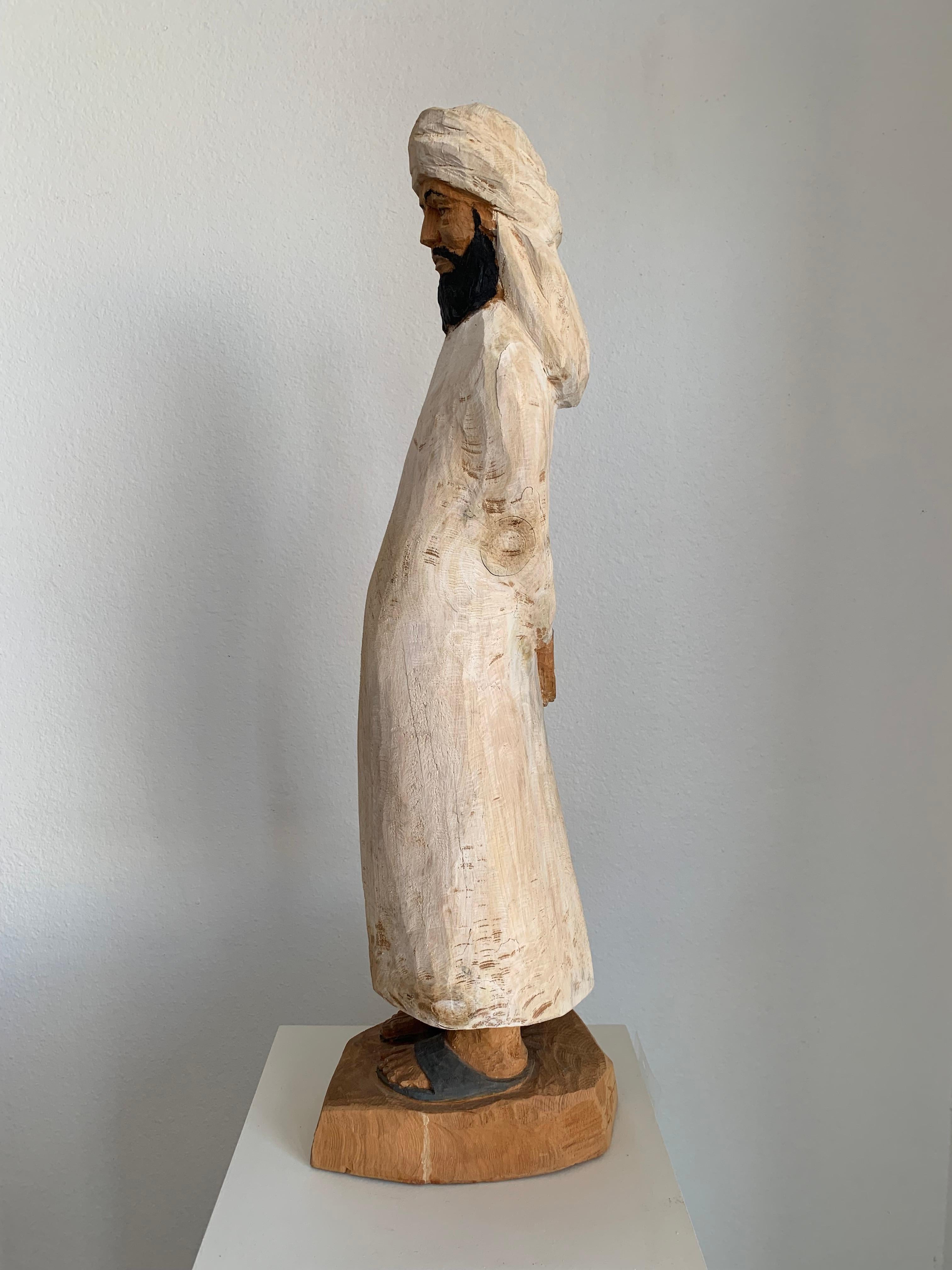 KHALID Wooden Sculpture Hand-Carved and Signed by the Artist with Gngraving - Brown Figurative Sculpture by Wolfgang Schott