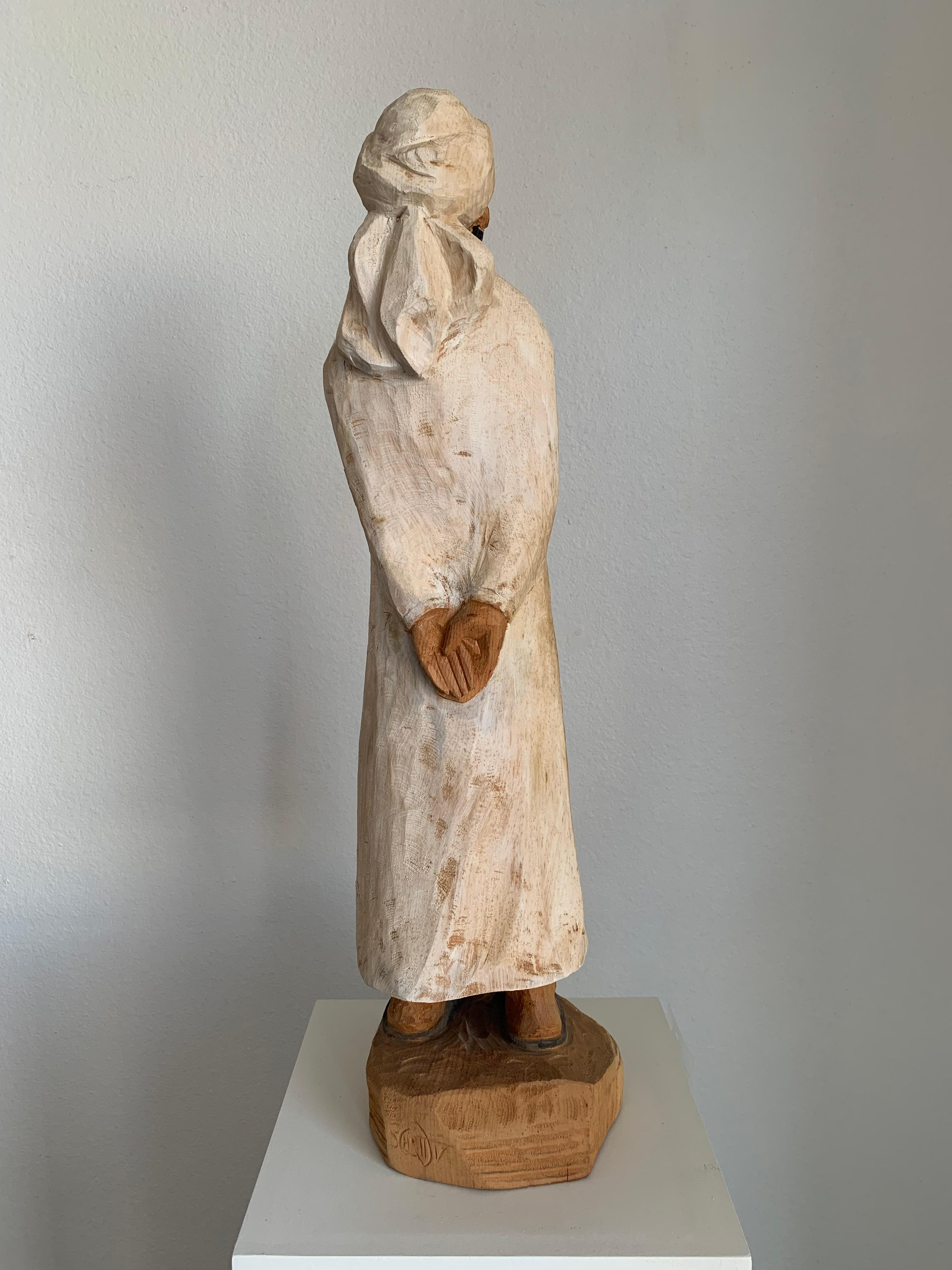 Khalid (2017) by Wolfgang Shott
Wooden sculpture hand carved with chainsaw and chisel
Signed by the artist with engraving
74 cm (29 inches) height including base, 25.4 x 20 cm (9 ½ x 8 inches) width

Wolfgang Schott (1953 – 2019) was a German wood