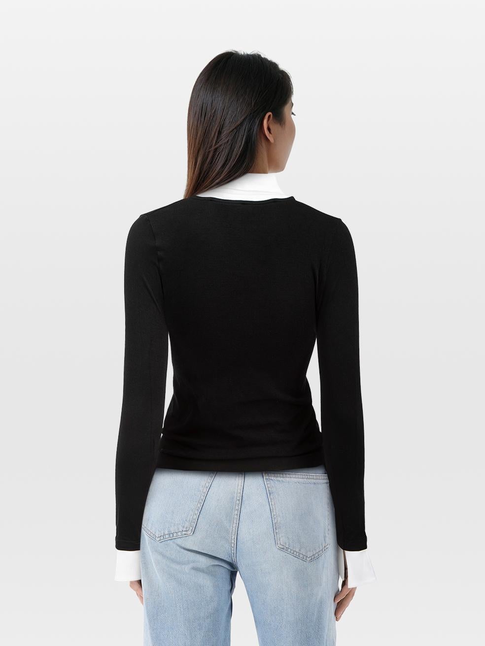CONDIZIONE: molto buona. L'usura della parte superiore è minima. L'usura della fodera sotto le ascelle di entrambe le maniche è minima e si nota un leggero scolorimento su questo articolo usato di Wolford. In caso di scolorimento, potrebbe essere