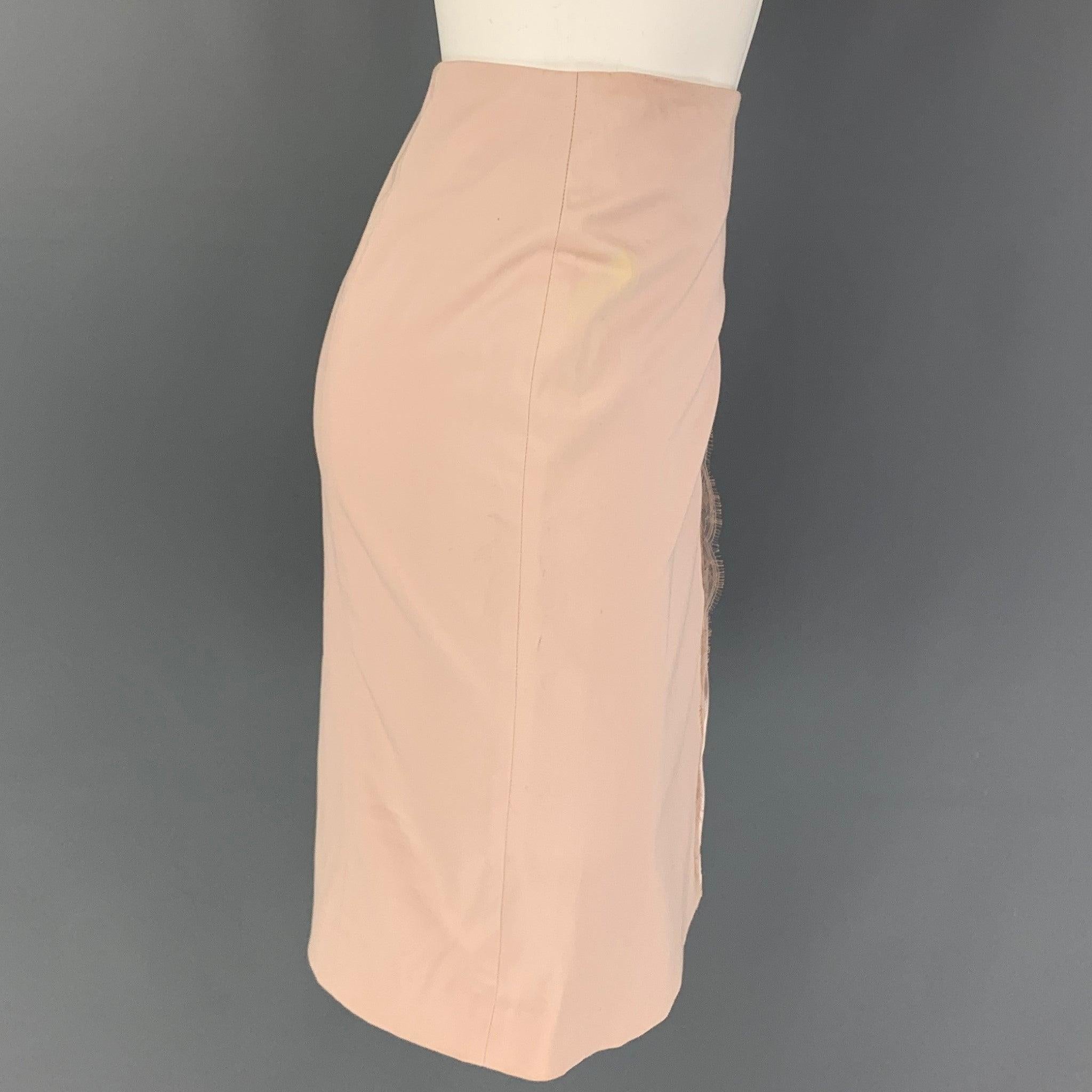 WOLFORD skirt comes in a blush cotton featuring a pencil style, lace trip, front slit, and a side zipper closure.
Very Good
Pre-Owned Condition. 

Marked:   UK 8 / US 4 / F 36 / I 38 

Measurements: 
  Waist: 29 inches  Hip: 36 inches  Length: 21.5